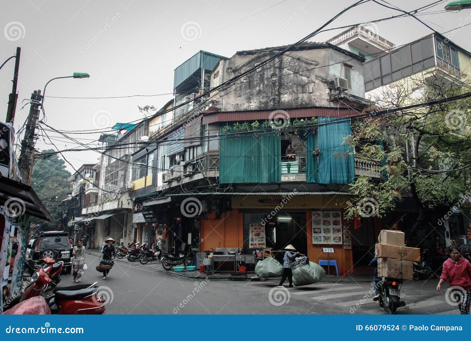 Crossing the road in Hanoi's old quarter, Hanoi, Vietnam Stock