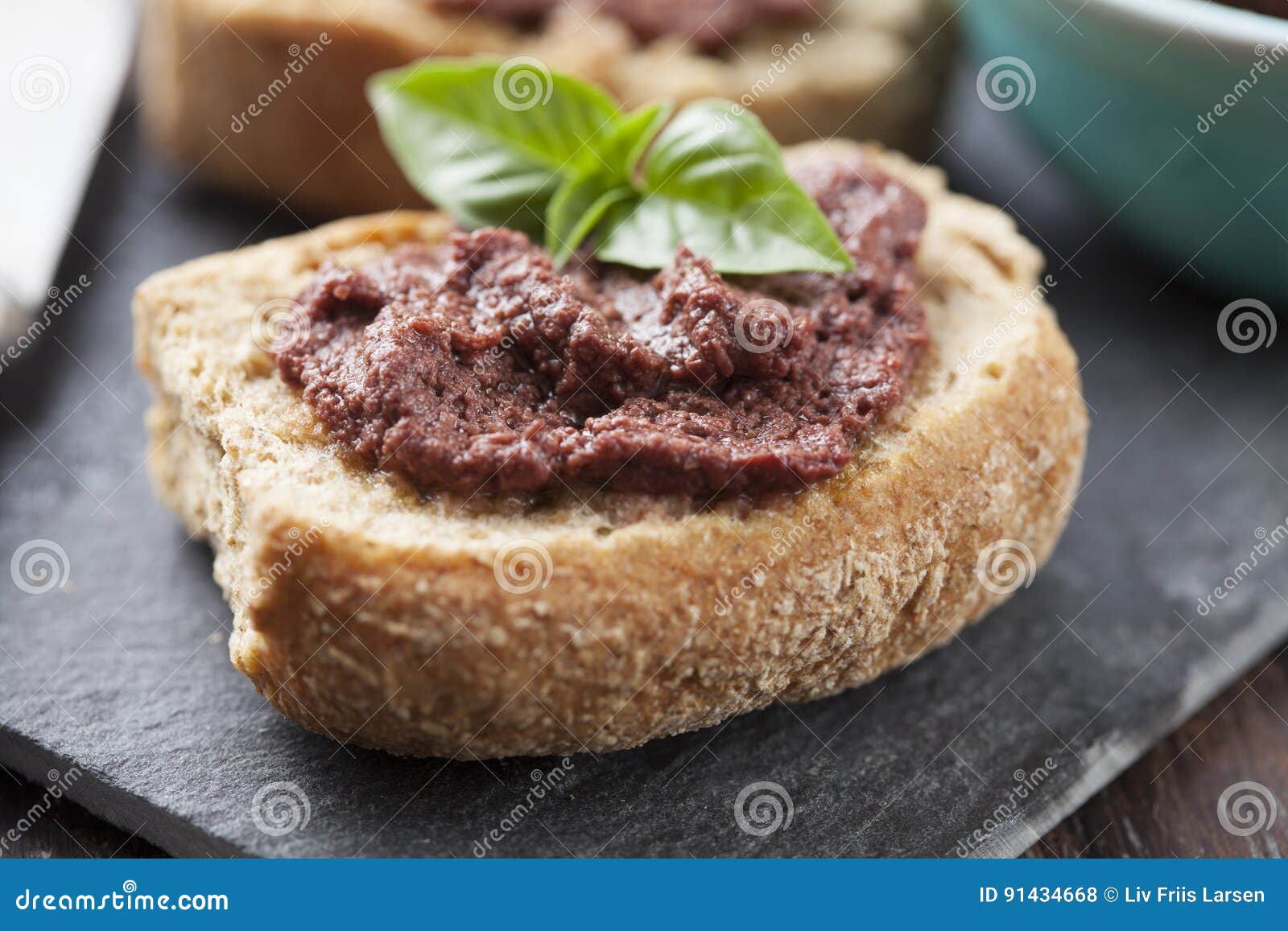 Crostini with olive paste stock photo. Image of eating 91434668