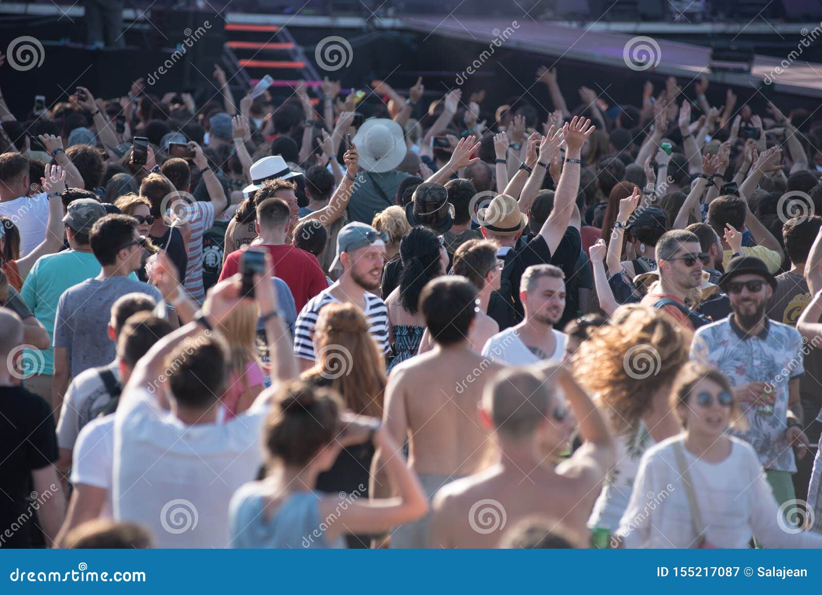 Crowd of Cheerful People Dancing at Music Festival Editorial ...