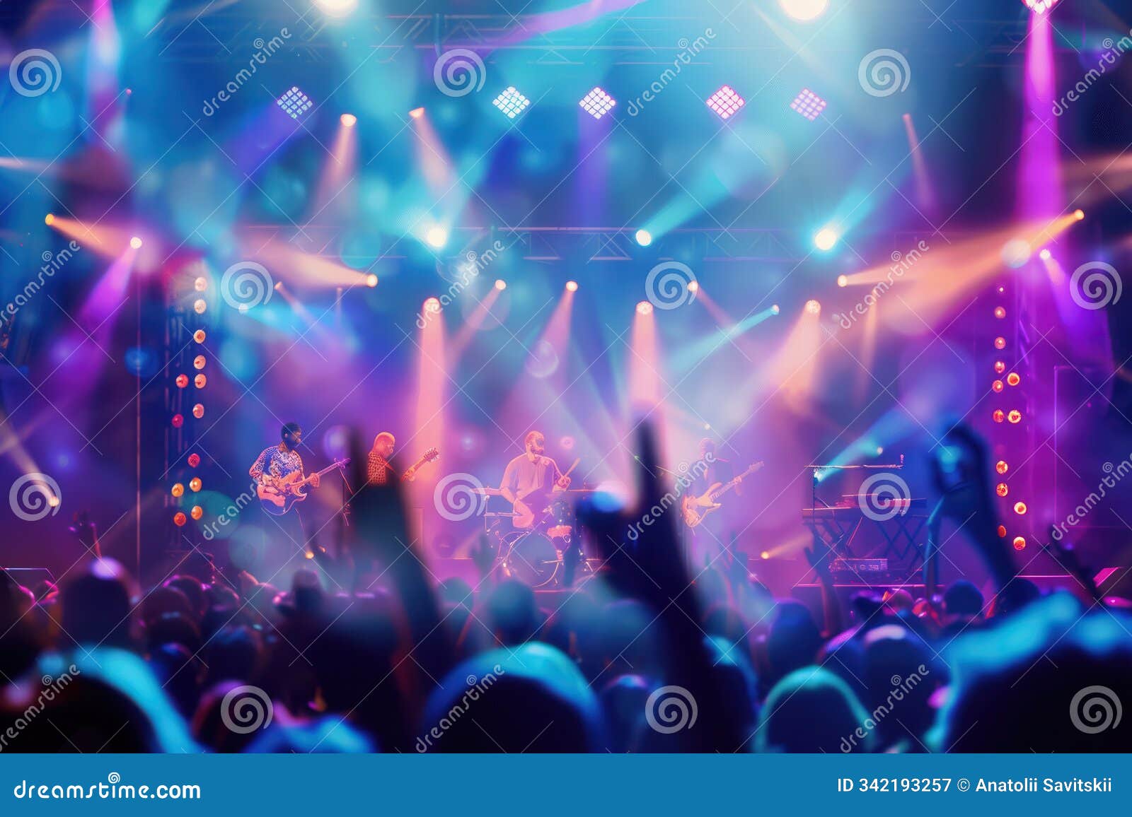 the crowd enjoys a thrilling live performance as musicians deliver an energetic show filled with colorful lights and