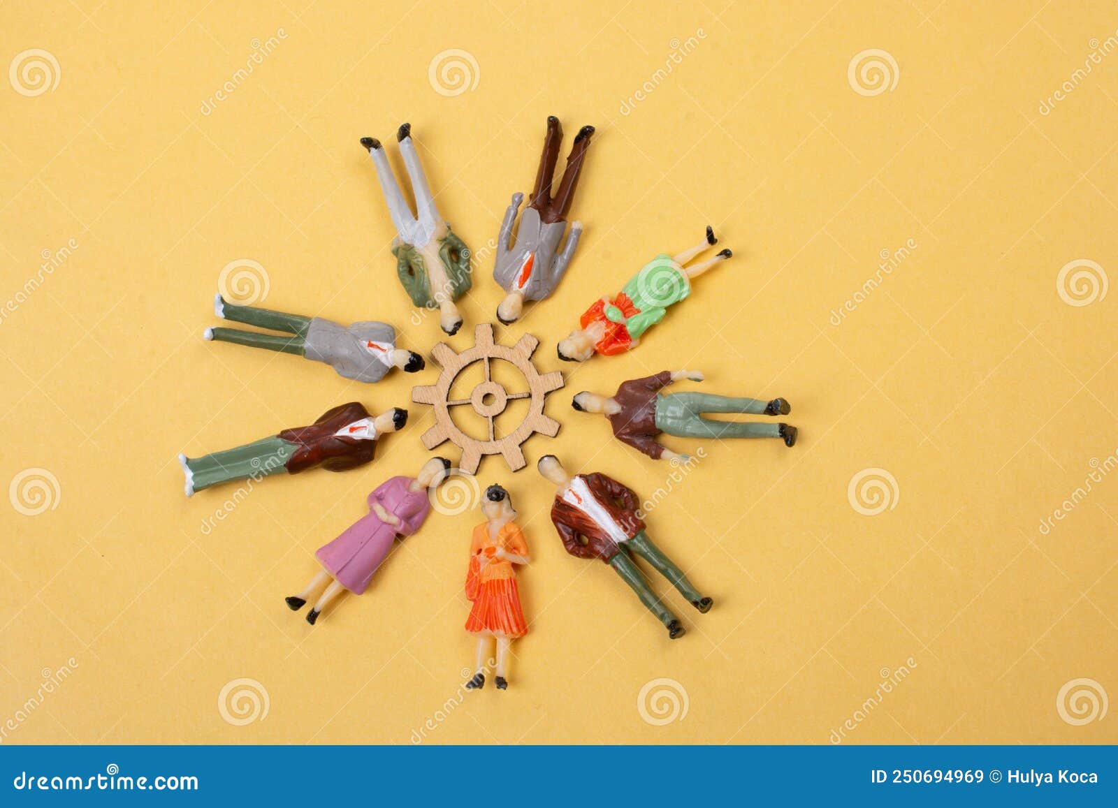 Crowd of Miniature People Figurine Around a Gearwheel Stock Image ...