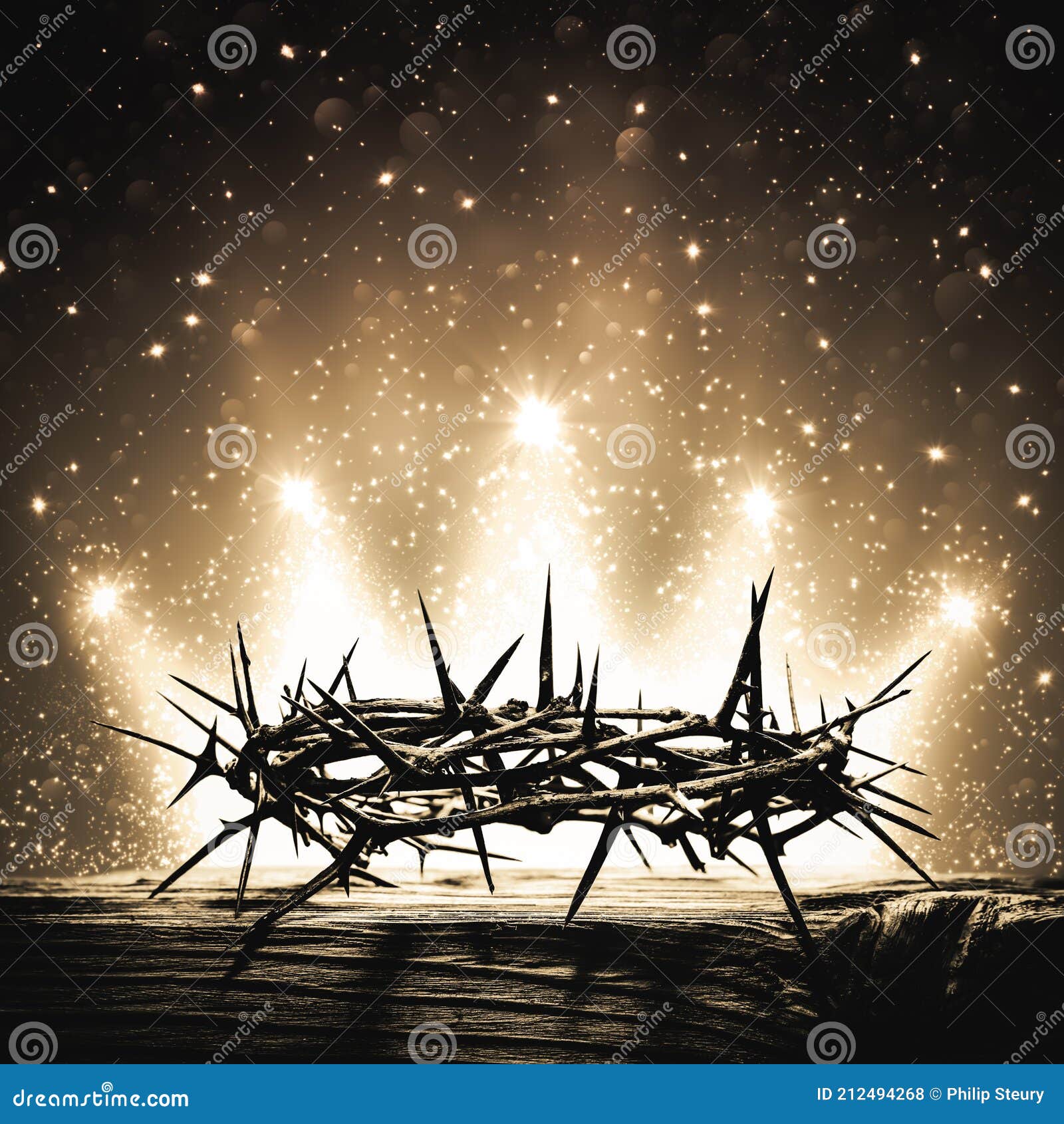 crown of thorns on wooden cross with bright sparkling crown of light in background