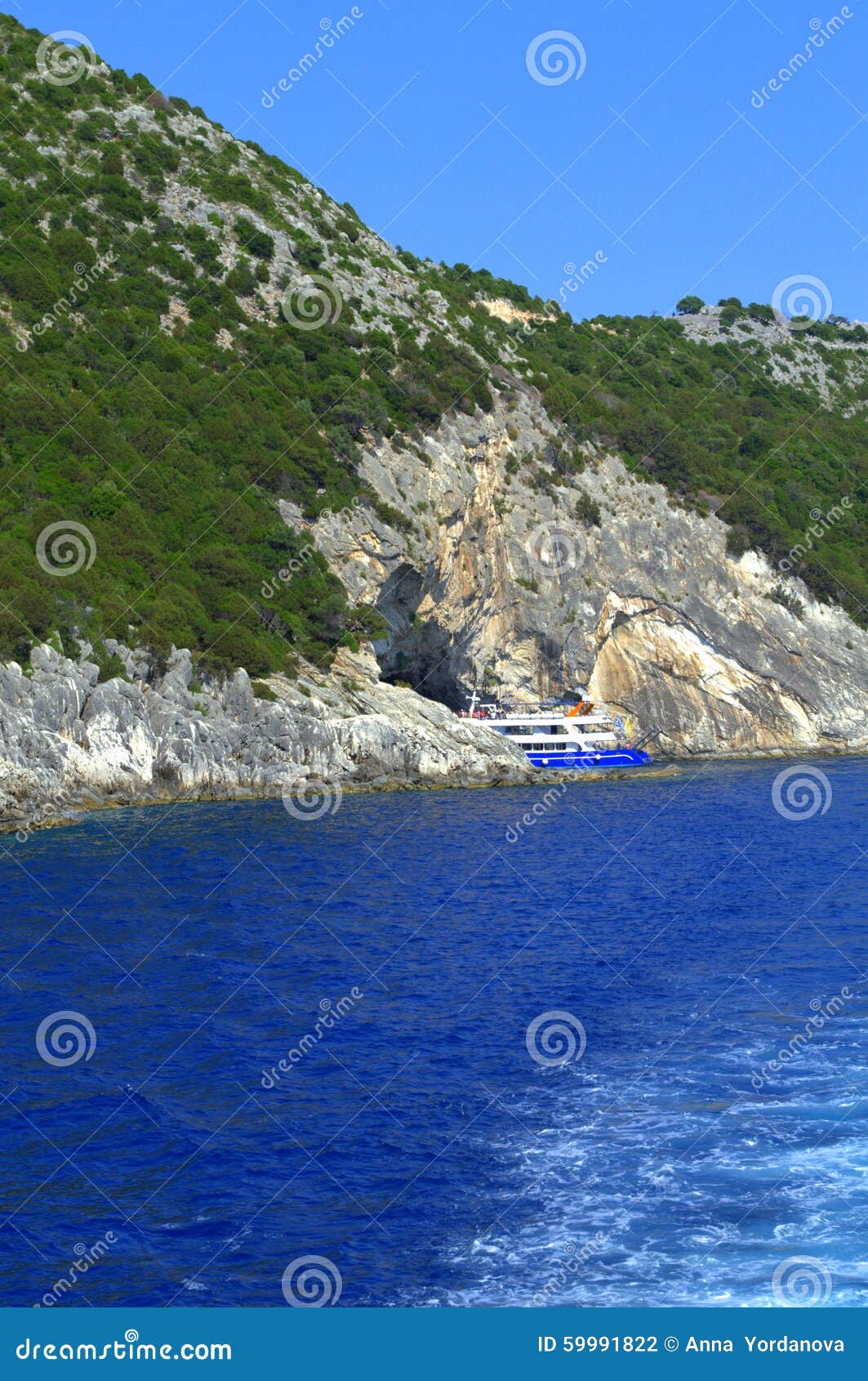 Cruise Boat In Papanikolis Sea Cave Stock Photo - Image ...