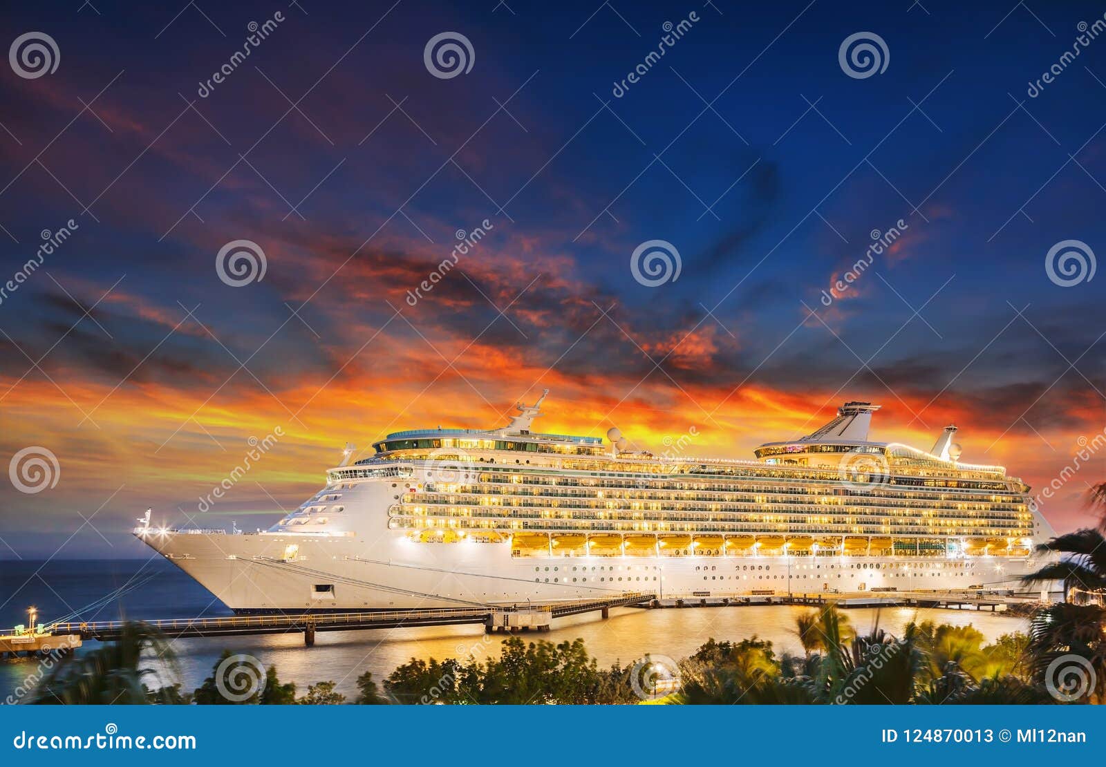 cruise ship in port on sunset.