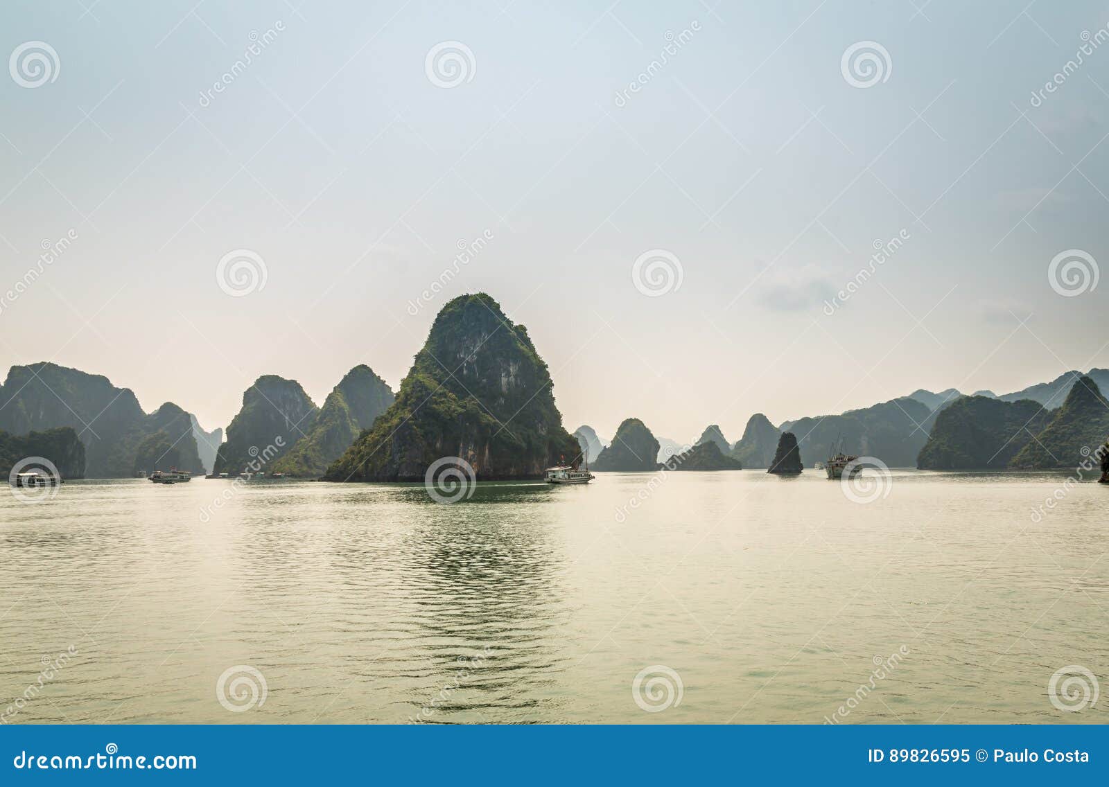 Cruising in Halong Bay, Vietnam. Ha Long Bay, in the Gulf of Tonkin, includes some 1,600 islands and islets, forming a spectacular seascape of limestone pillars. Because of their precipitous nature, most of the islands are uninhabited and unaffected by a human presence. The site`s outstanding scenic beauty is complemented by its great biological interest