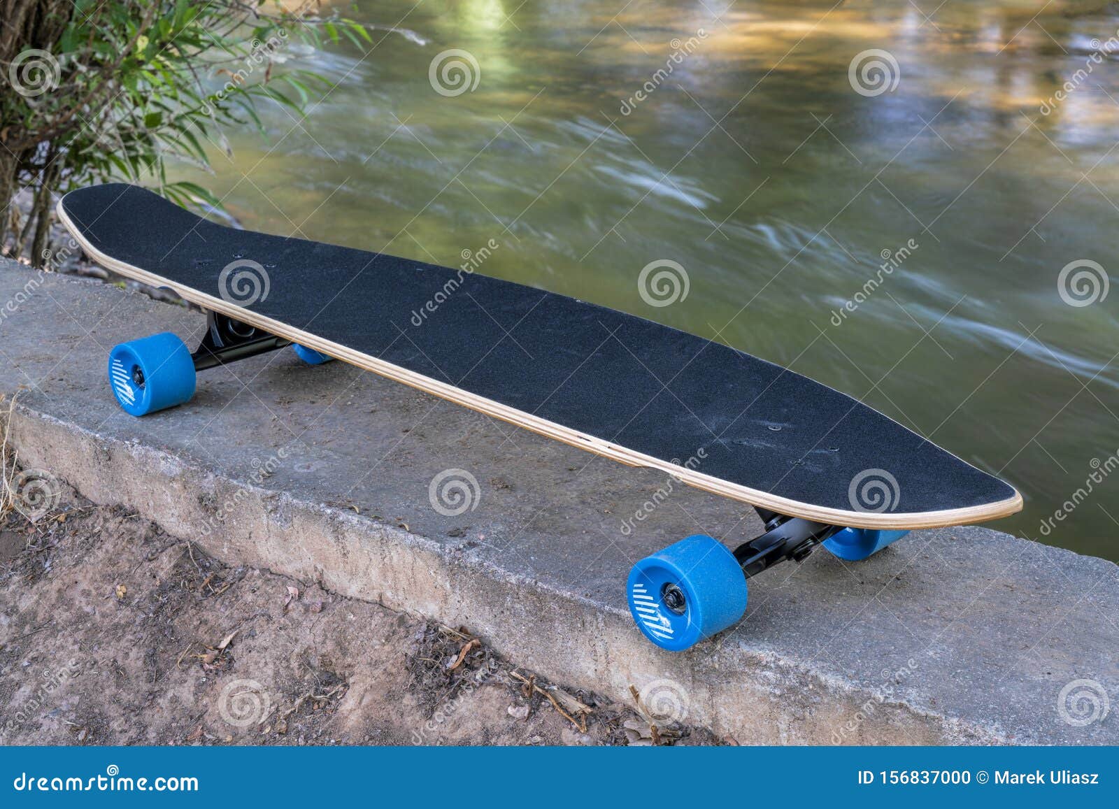 Cruising Longboard on River Shore Stock Photo Image of skating, longboard 156837000