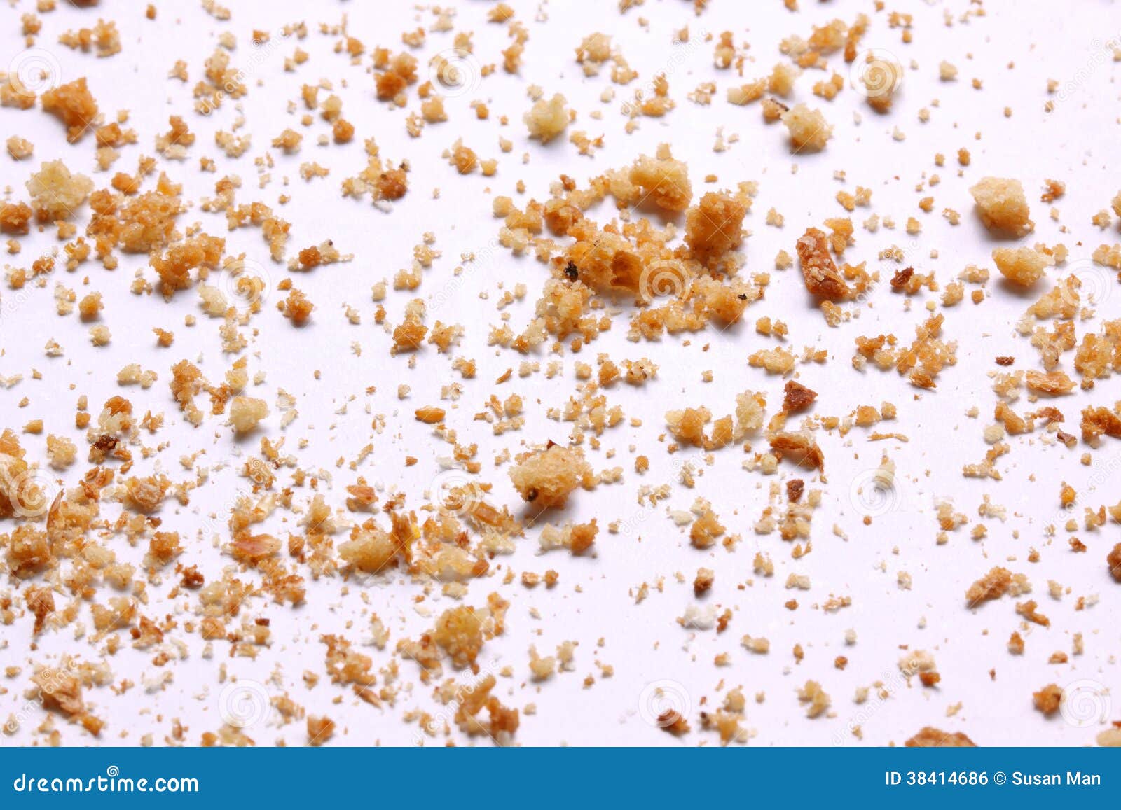 crumbs on white background close-up view