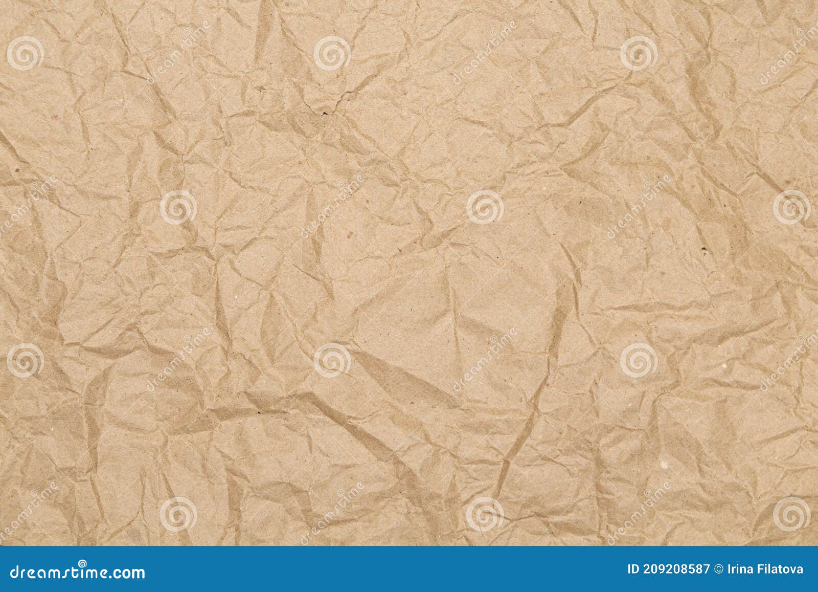 Crumpled Brown Wrapping Paper. Texture and Background Stock