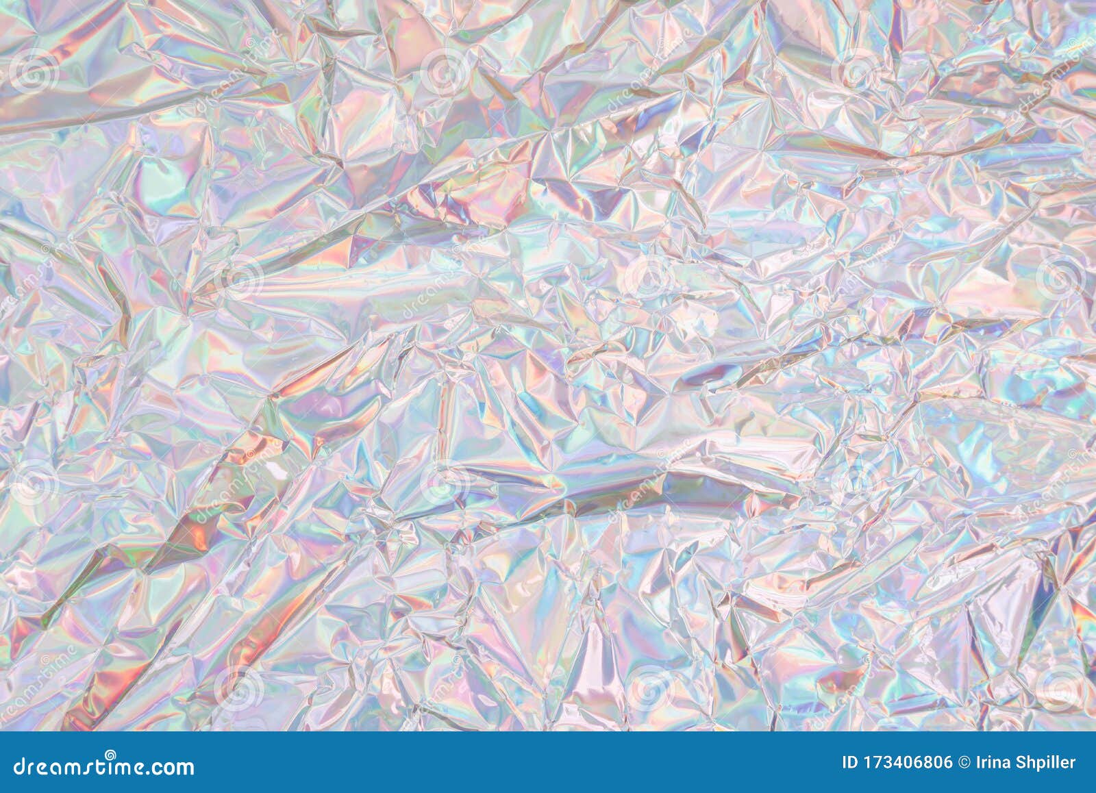Crumpled Holographic Wrapping Paper with Shiny Effect. Close Up