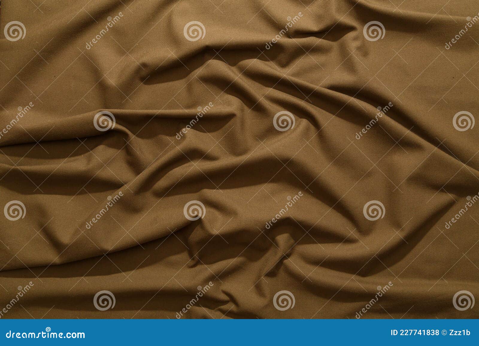 crumpled khaki tan crumpled tan khaki canvas fabric - full frame background and texture