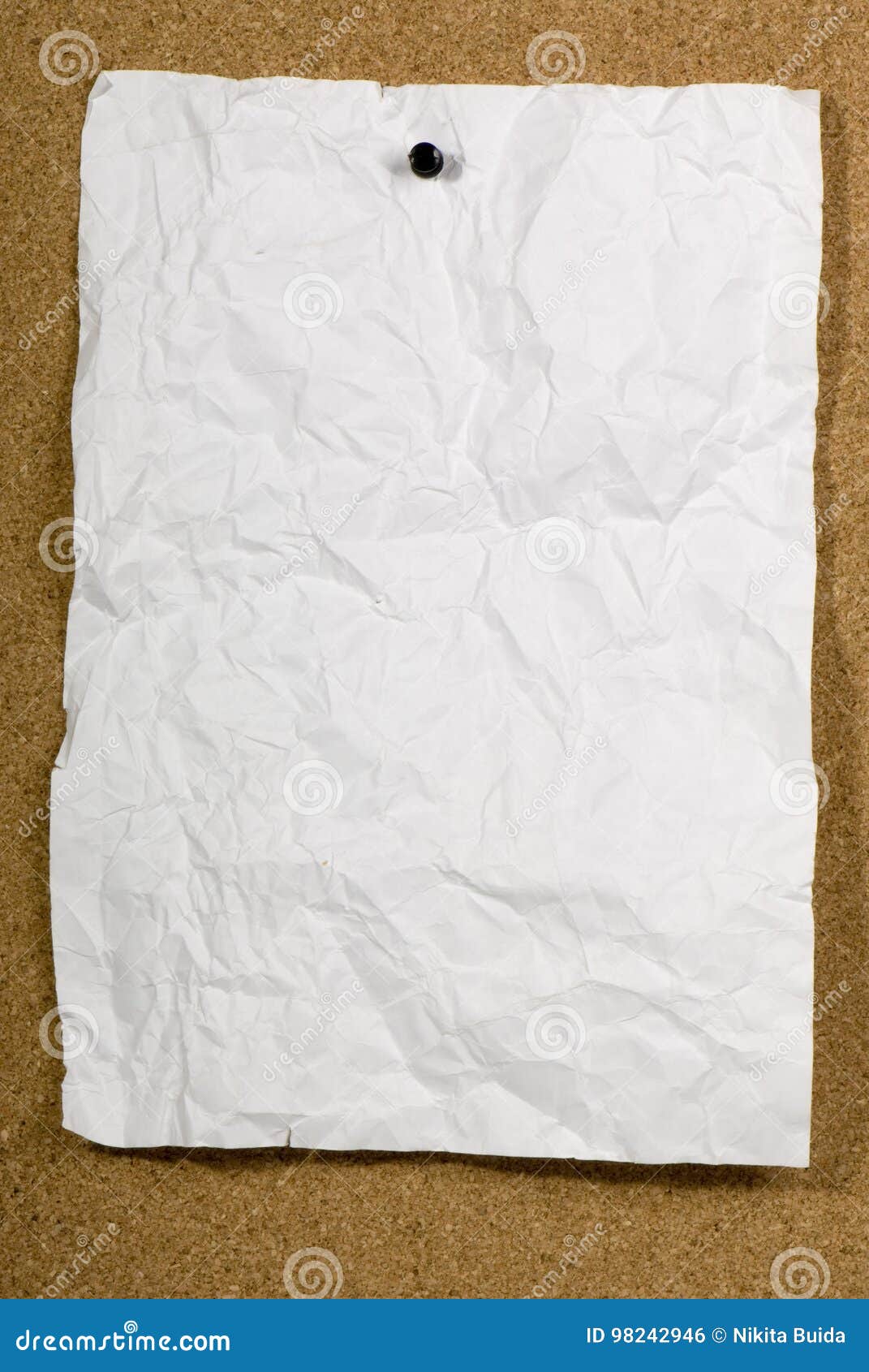 Crumpled Paper on a Bulletin Board Stock Photo Image of torn