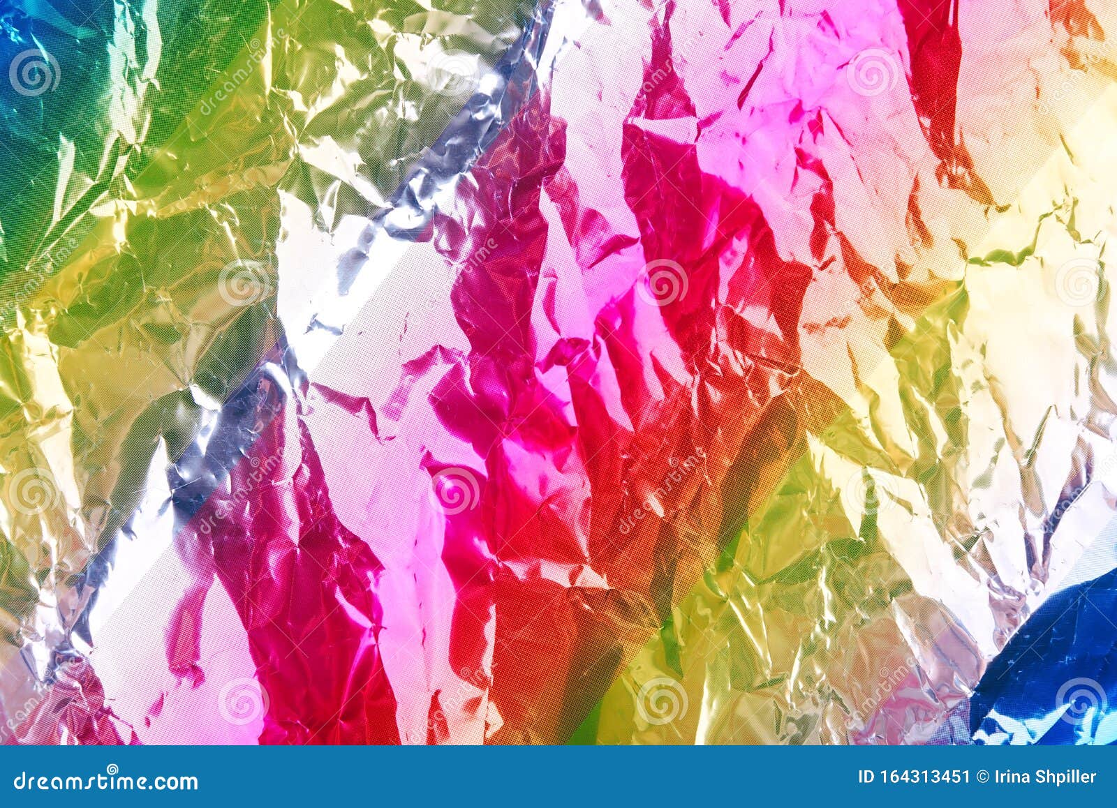 Crumpled Rainbow Wrapping Paper with Shiny Effect. Close Up Stock Image