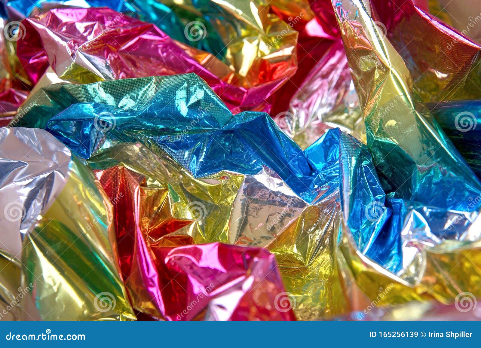 Crumpled Rainbow Wrapping Paper with Shiny Effect. Close Up Stock Image
