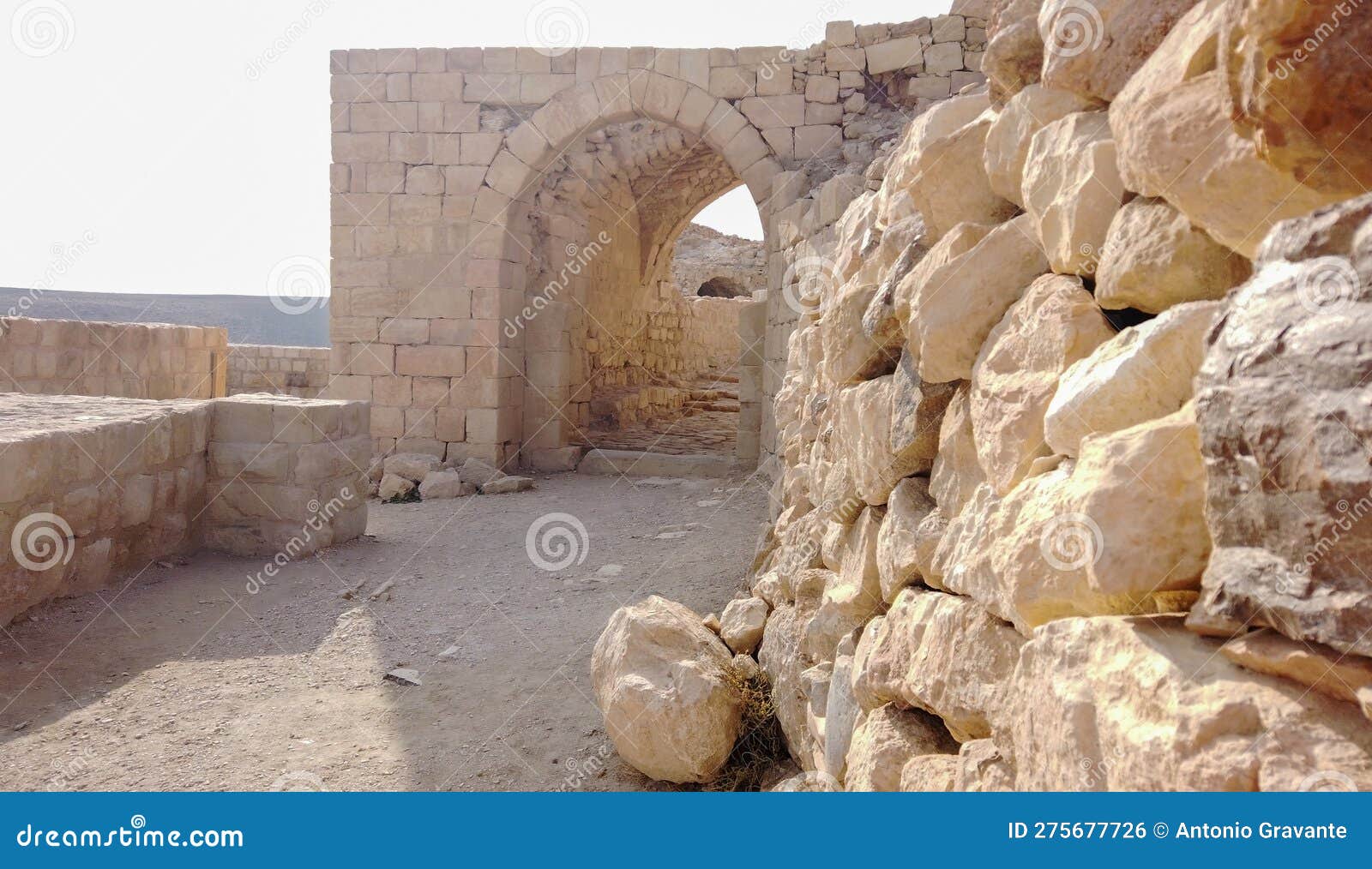 the crusader castle of kerak, perched on the hill overlooking the city of the same name