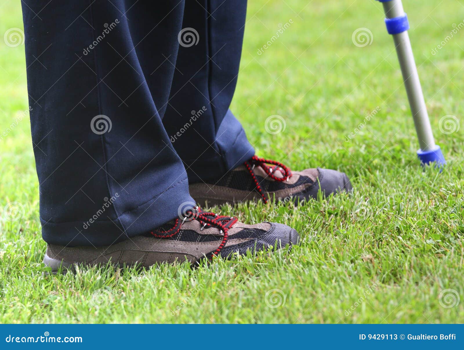 Crutches and legs stock image. Image of green, medical 9429113