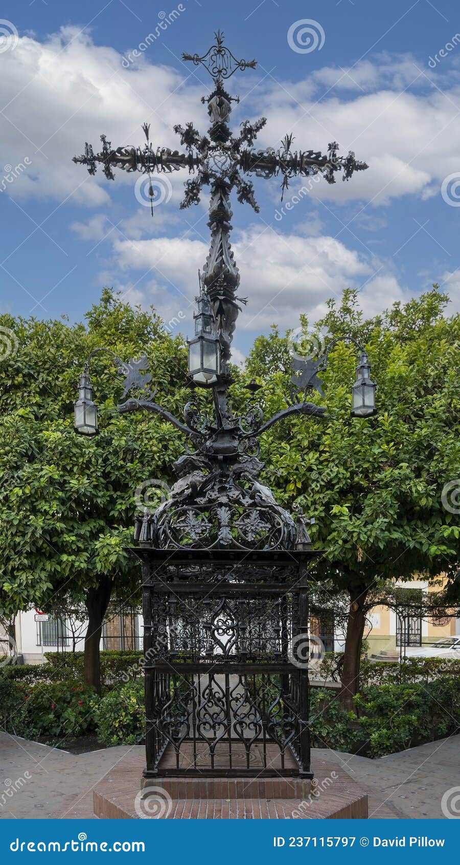 cruz de la cerrajeria, the locksmith cross, located in plaza santa cruz in seville, spain.