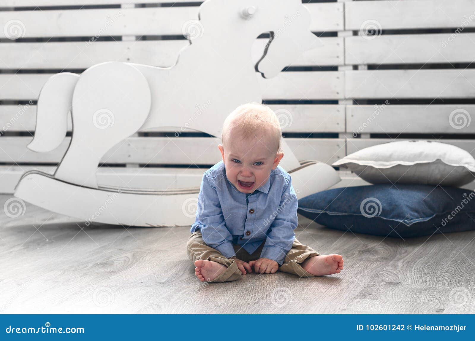 Crybaby Boy Sittin On The Floor. Baby Crying And Screaming. Stock Photo Image of hair, mood