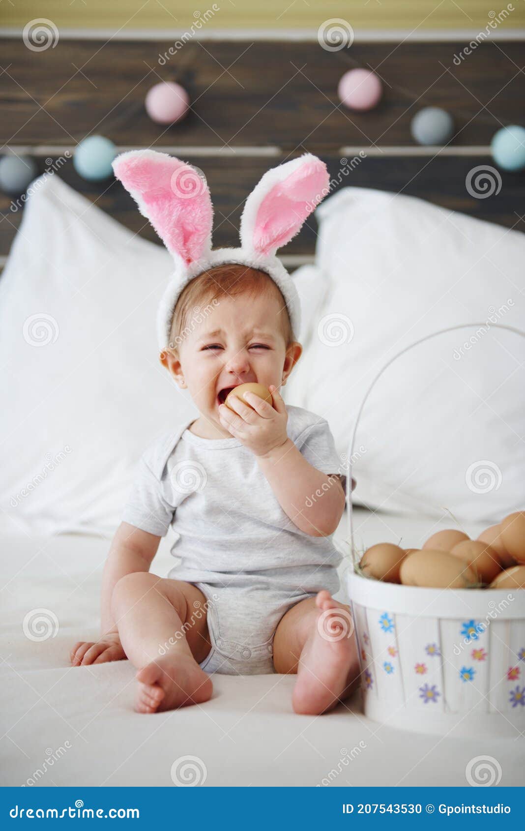 Crying Baby Eating an Egg in Bed Stock Photo Image of charming