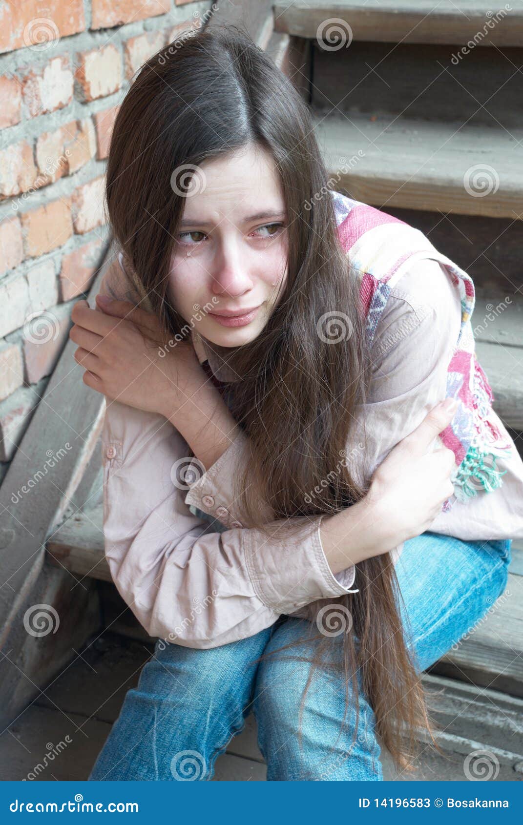 Crying girl on stairs stock image. Image of female, fear - 14196583