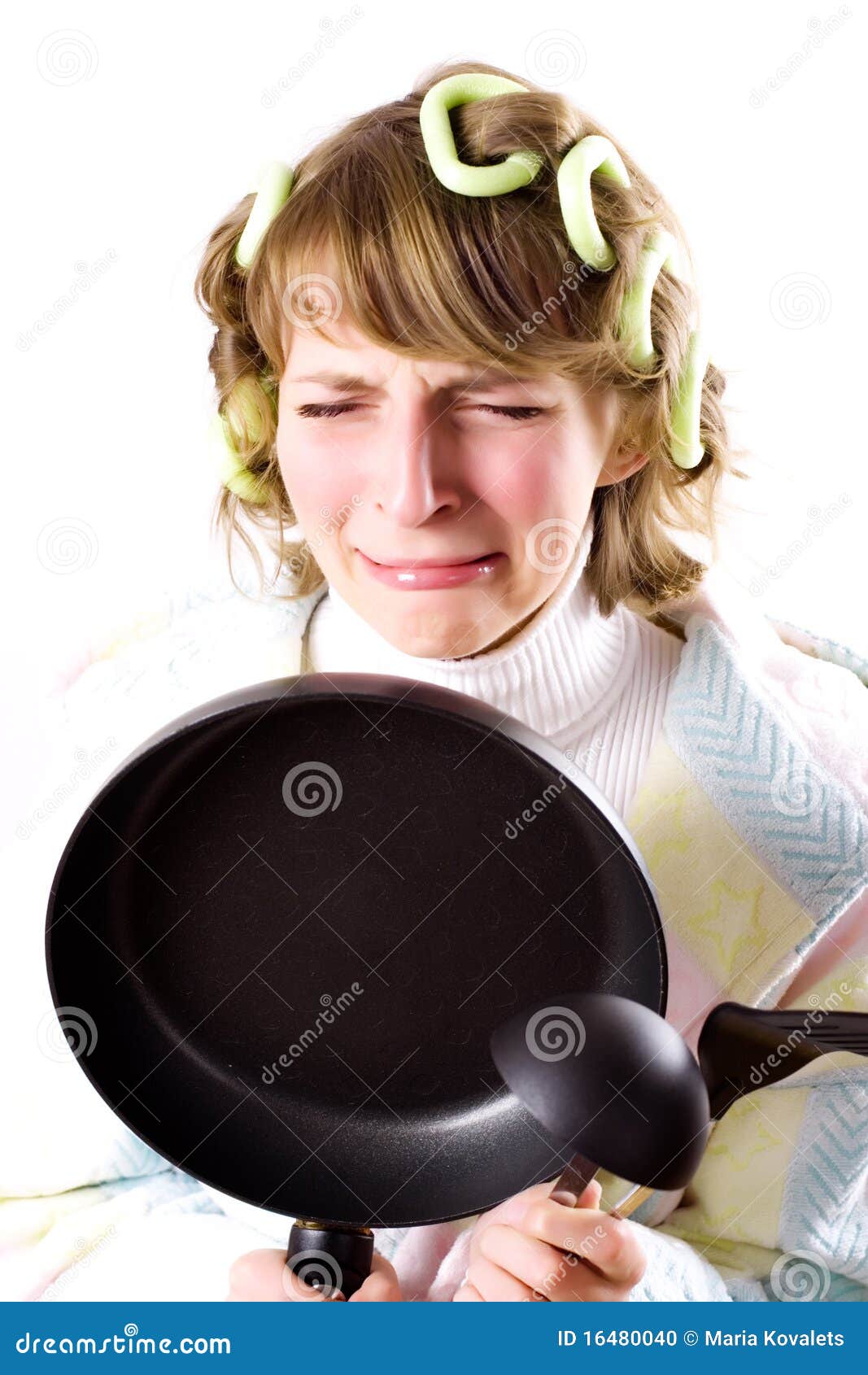 Crying housewife with pan isolated on white background