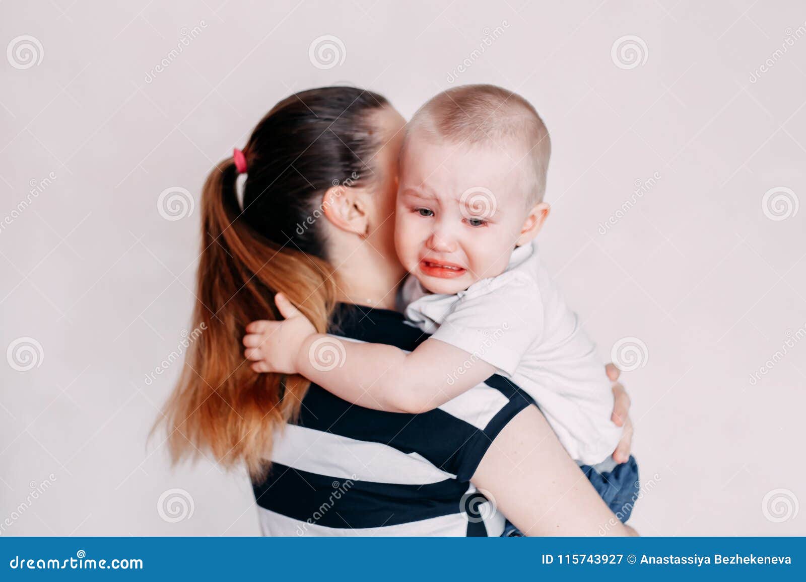 Crying Toddler Girl Being Consoled by Her Mother Stock Image ...