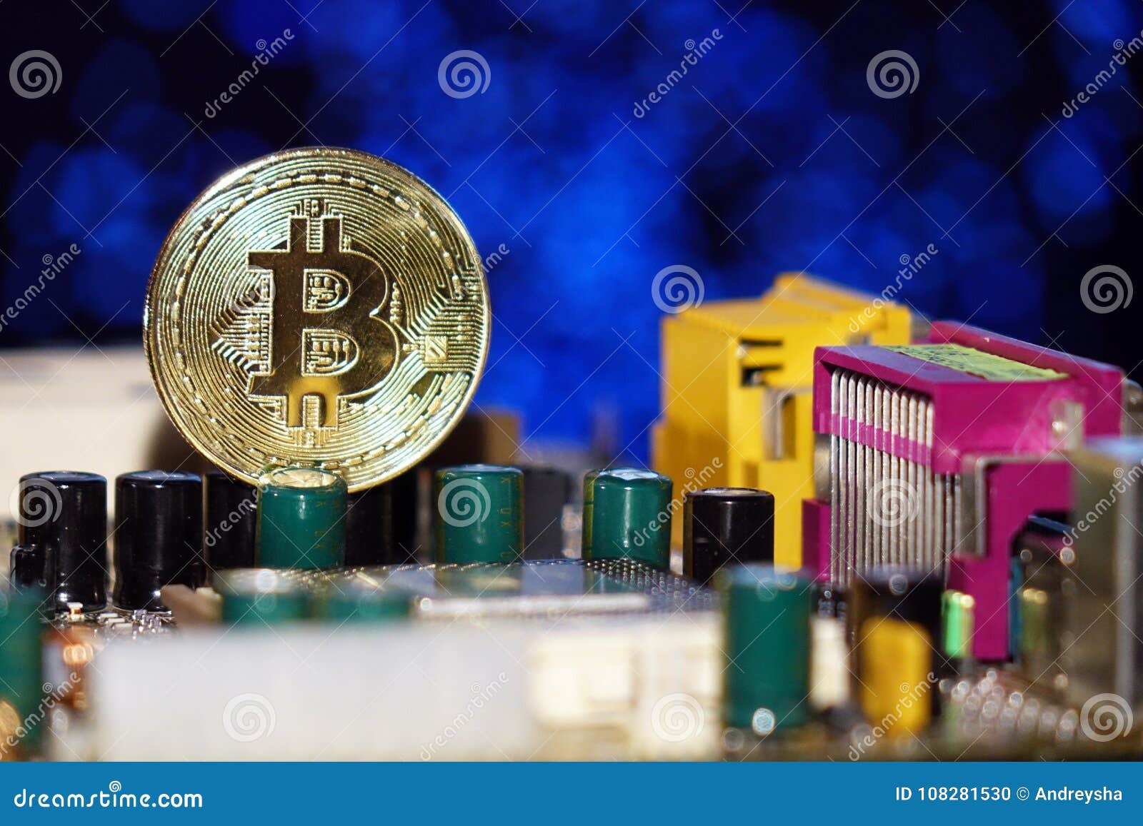 Cryptocurrency Bitcoin Gold. Bitcoins On The Motherboard ...