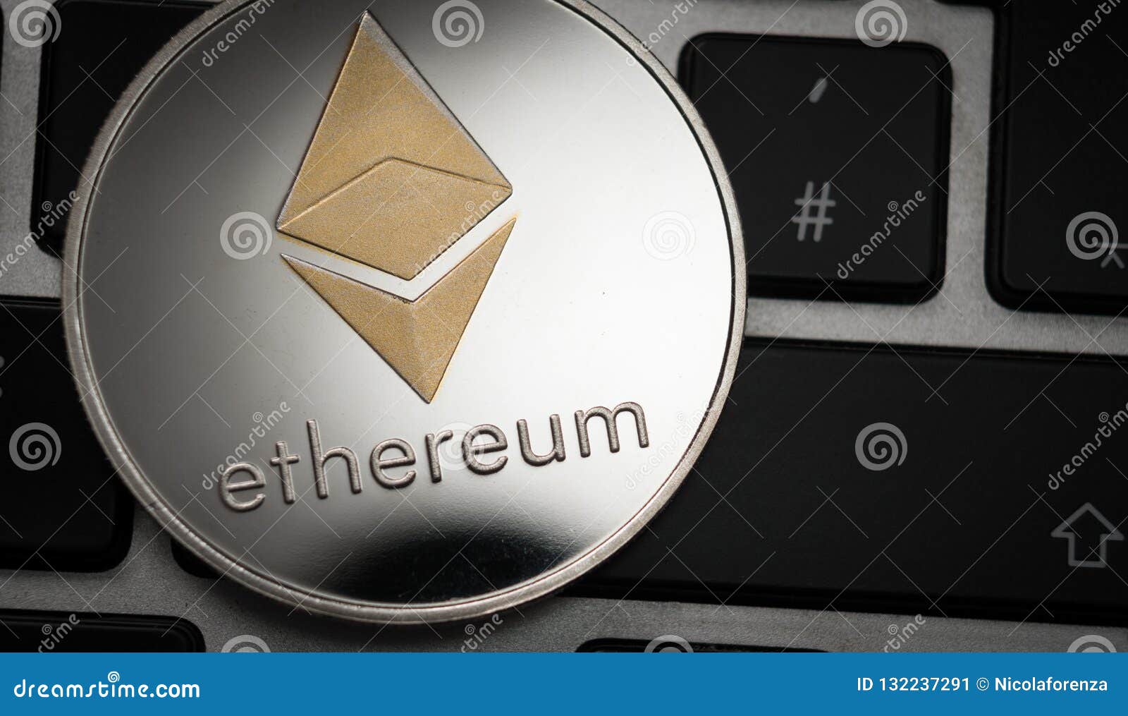 Cryptocurrency Ethereum Coin On Computer Laptop Keyboard ...