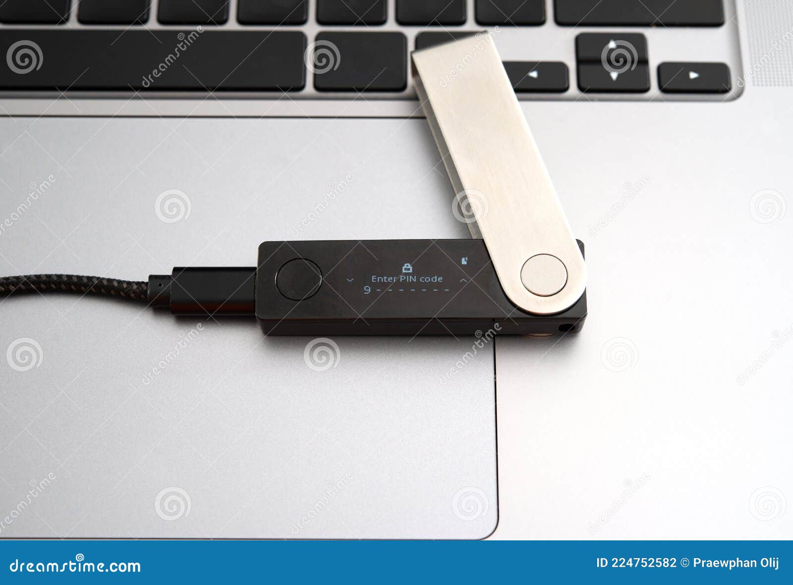 Cryptocurrency Hardware Wallet the Screen Waiting for Pin Code To Be Enter  on Laptop Keyboard. Stock Photo - Image of cold, currency: 224752582