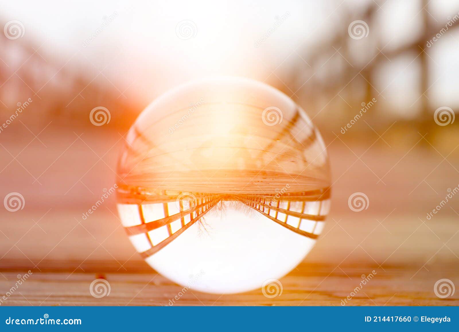 A Crystal Ball for Optical Illusion. Nature View through a Crystal Ball