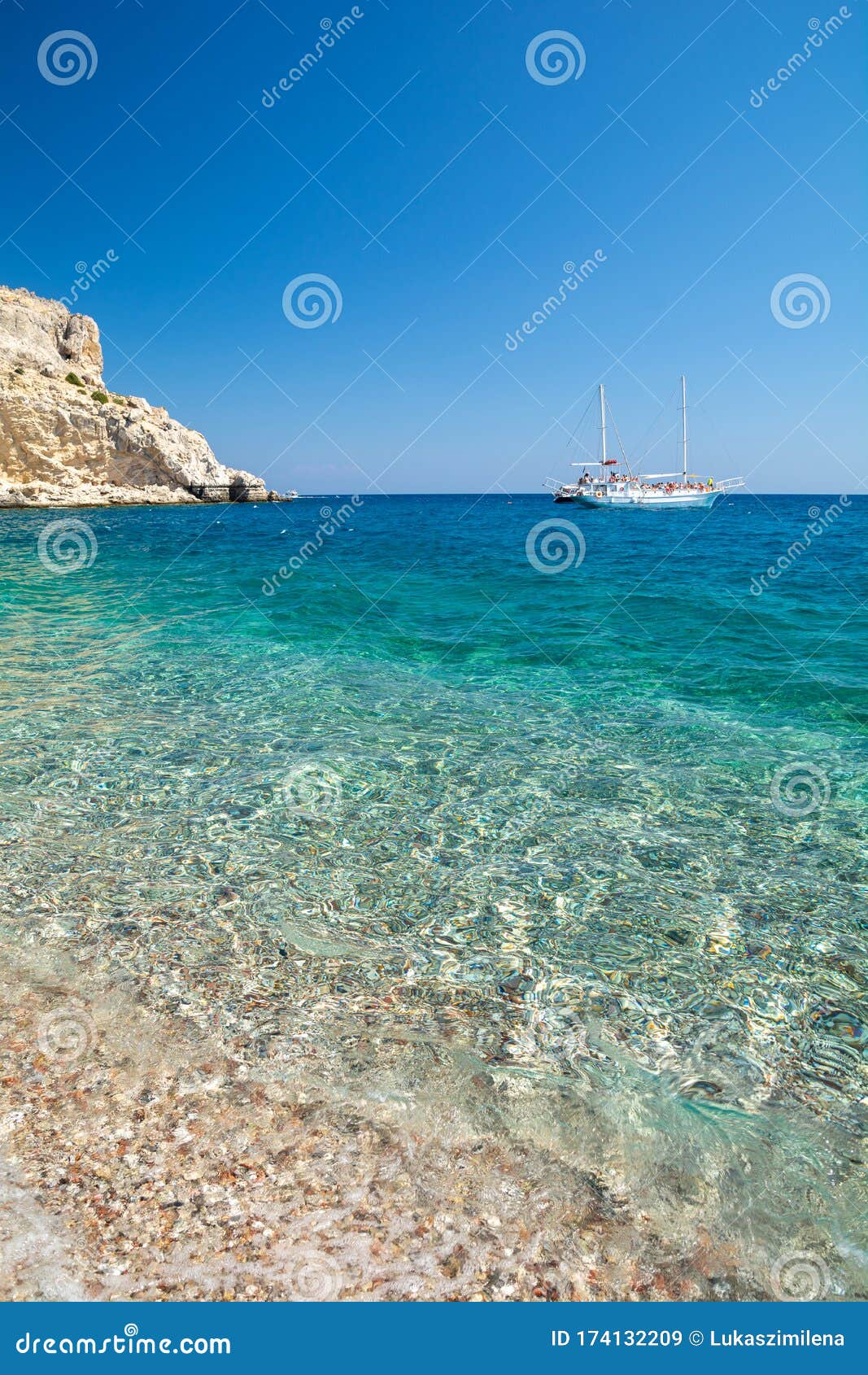 Crystal Clear Water of Mediterranean Sea on Afandou Beach on