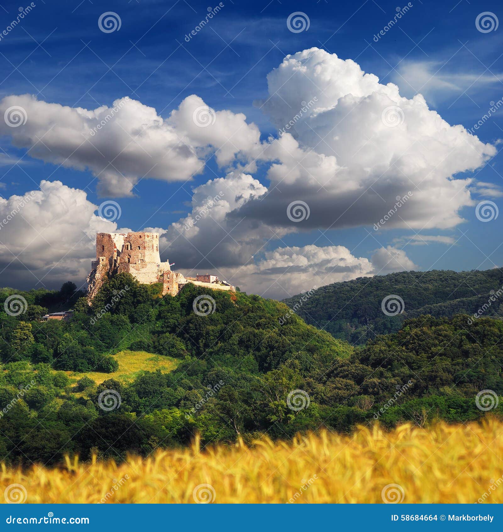 csesznek castle with blue cloudy sky in hungary