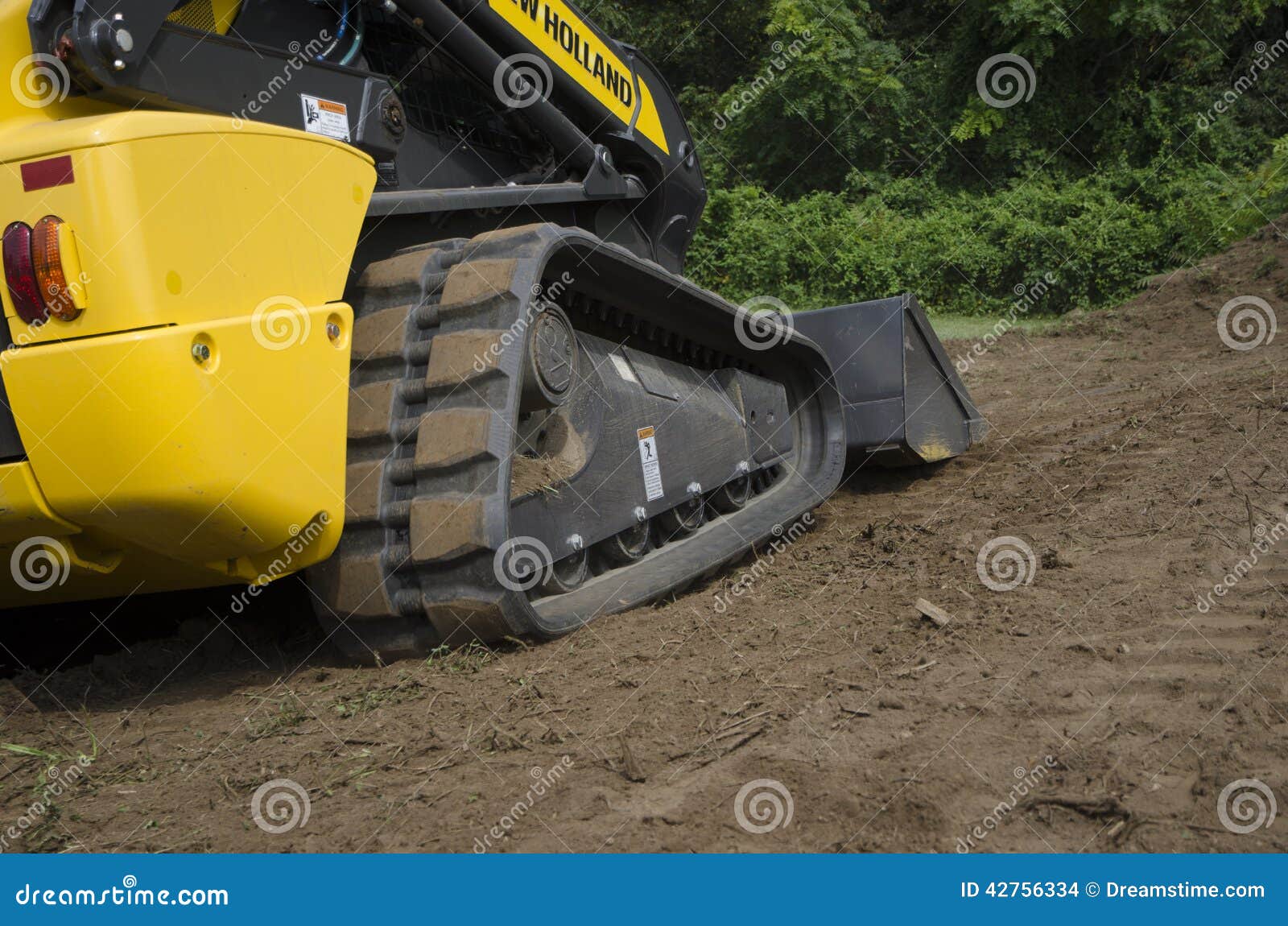 CTL Pushing Dirt editorial stock image. Image of plant 42756334