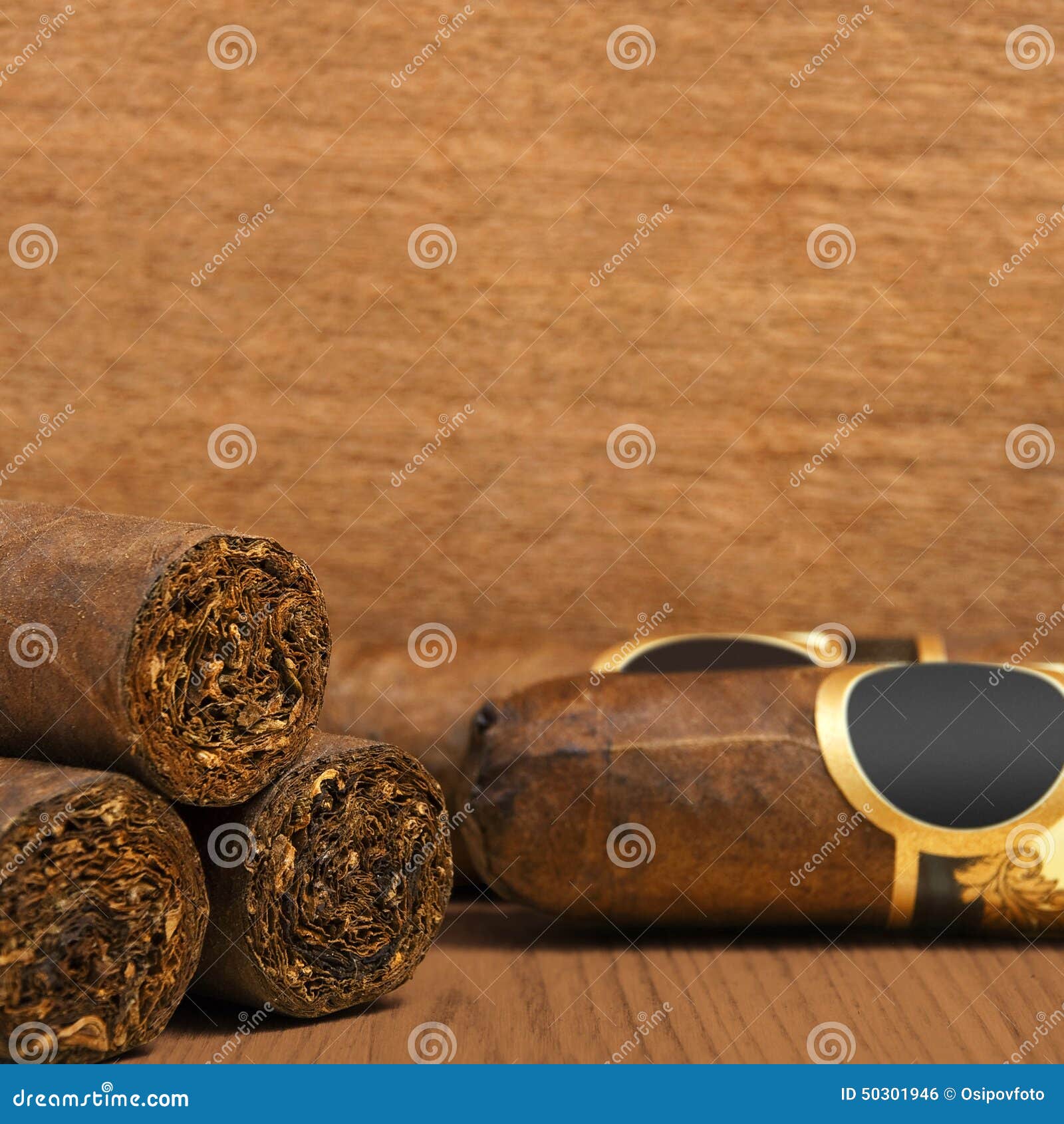 cuban cigars on wooden background
