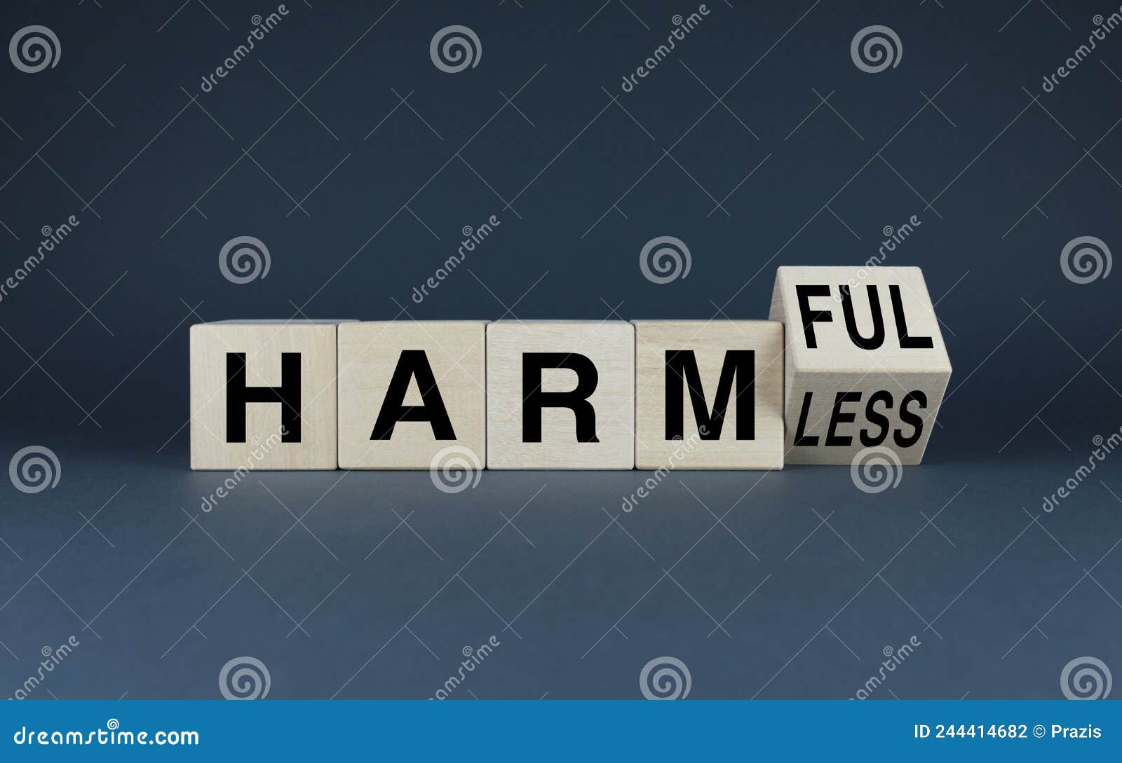 cubes form the words harmful or harmless. expanded concept from food to ecology
