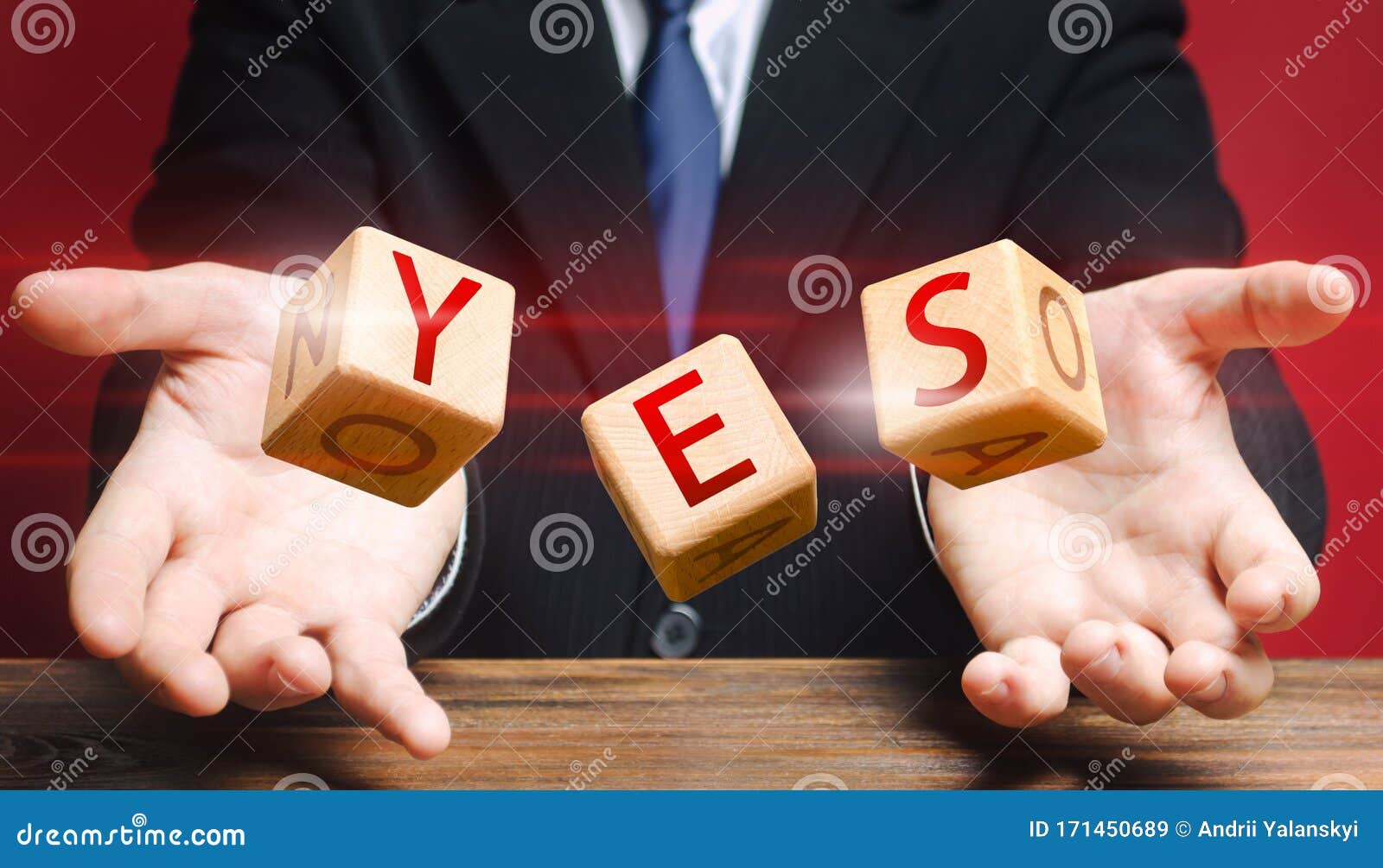 cubes thrown by a man make up word yes. agreement and acceptance, answer the question. courage, irresistibility, zeal forwards,