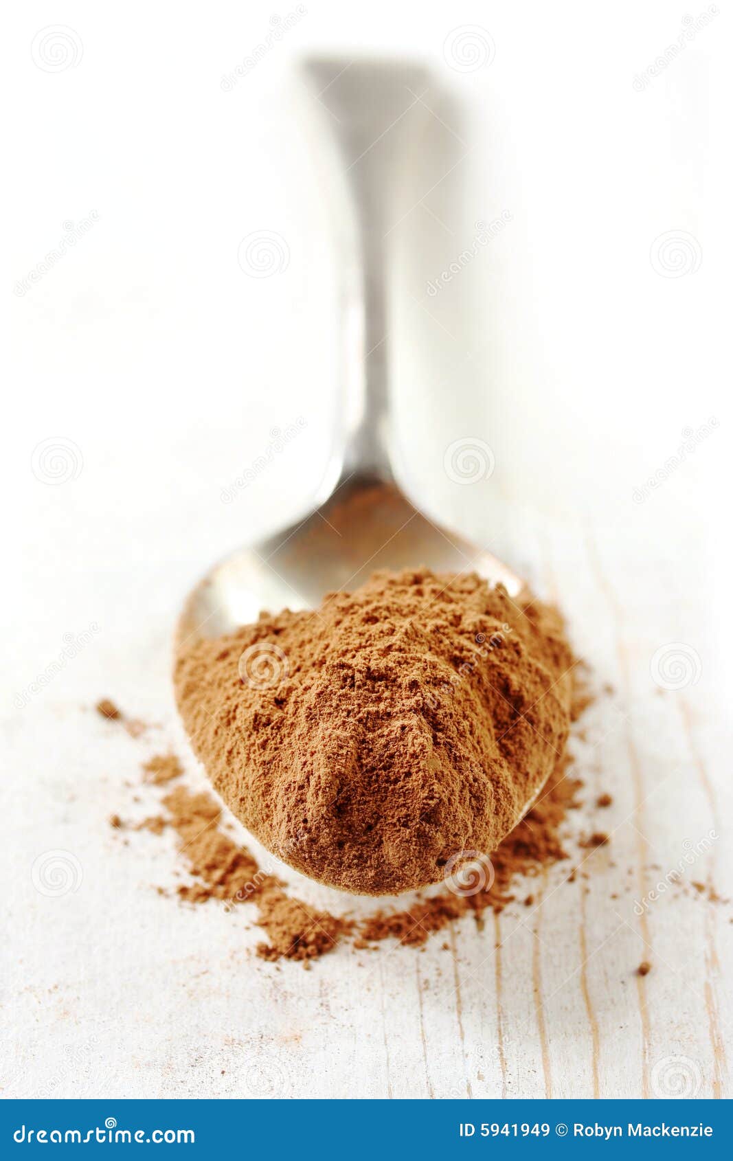 Cucharada De Polvo De Cacao Imagen de archivo Imagen de cierre