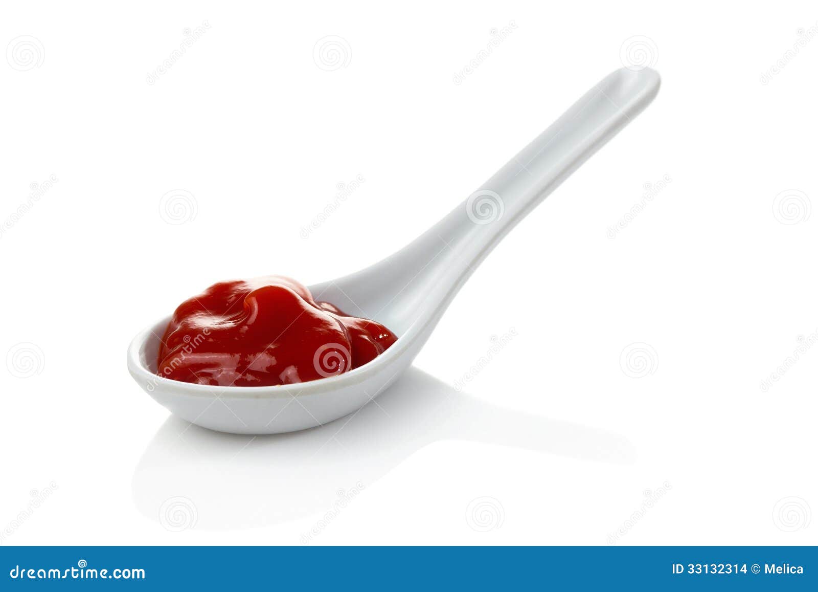 Cucharada De Salsa De Tomate Foto de archivo Imagen de inmersiones