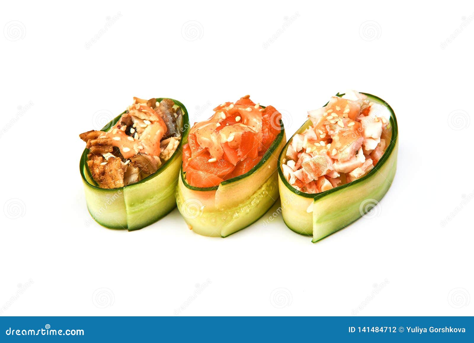 Cucumber Rolls with Ham and Cream Cheese on White Background Stock