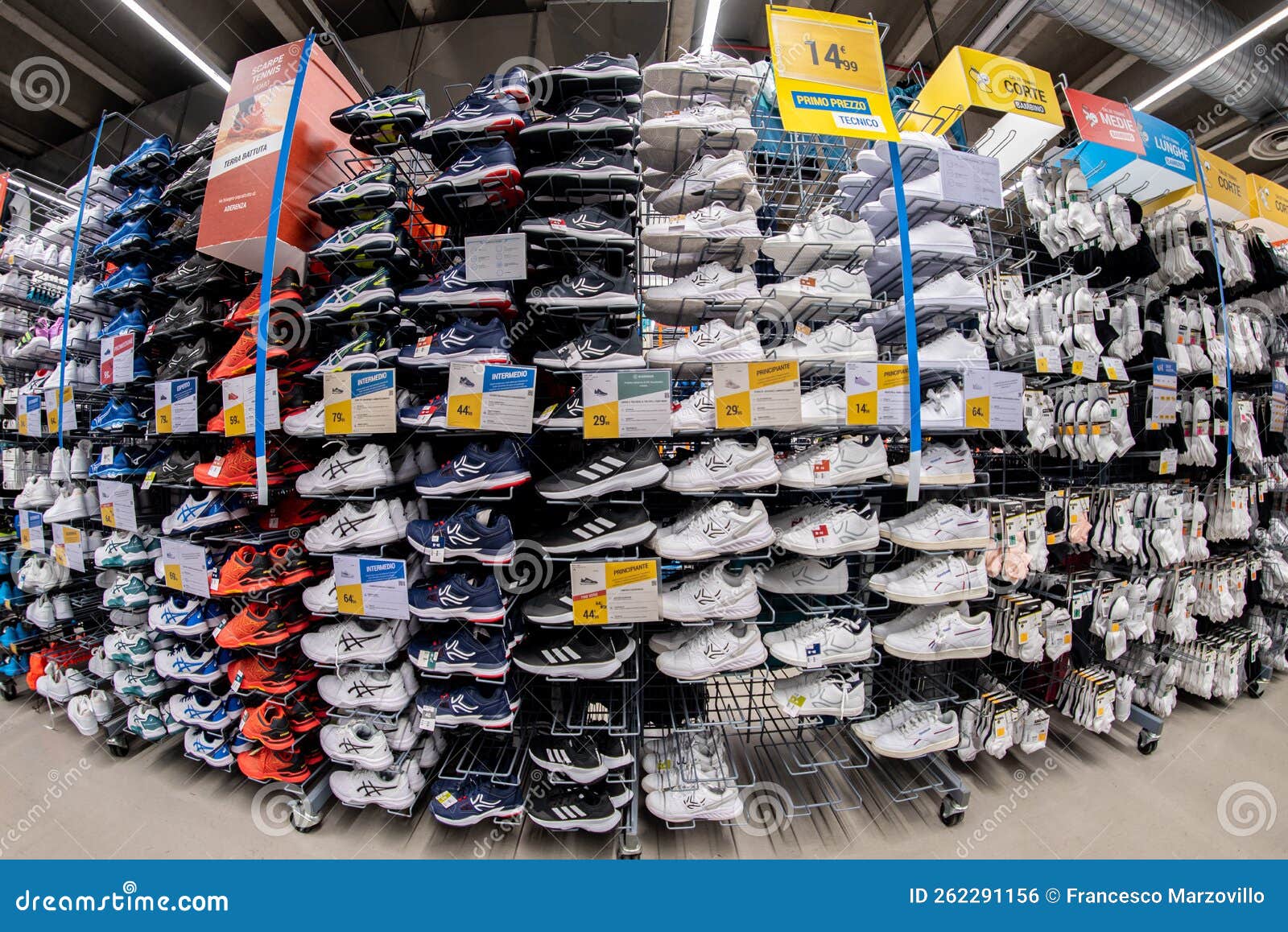 Tennis Shoes Displayed Above Shelves in Italian Decathlon Store ...