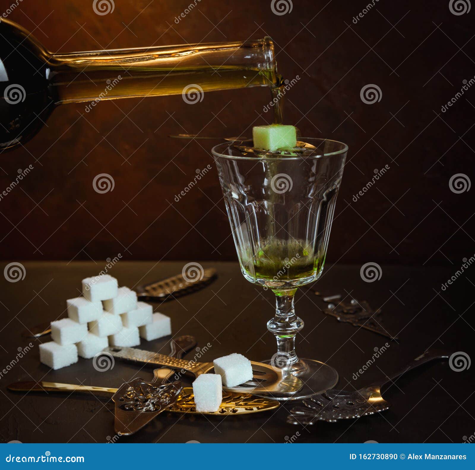 Cup with Absinthe and Some Sugar Cubes. Absinthe Ritual Stock Photo
