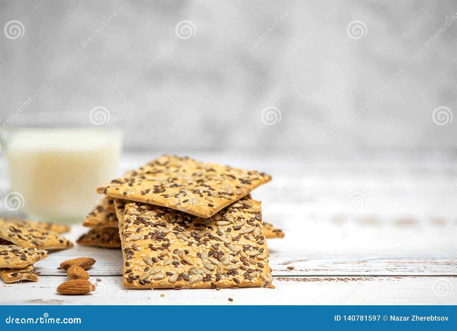 Cup of Almond Milk and Stack of Whole Grain Biscuits on Light