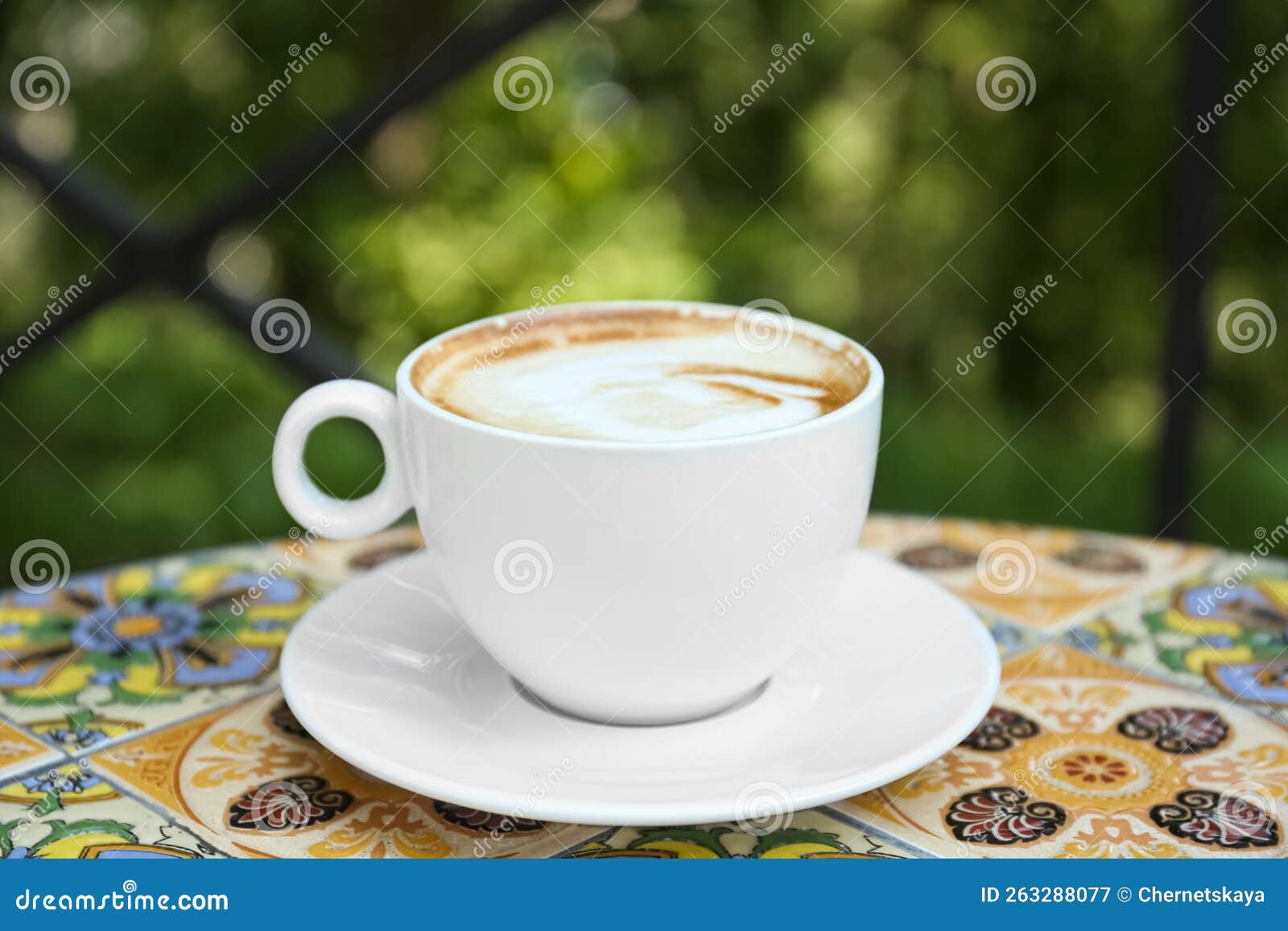 Cup of Aromatic Coffee on Beautiful Table in Cafe Outdoors Stock Image