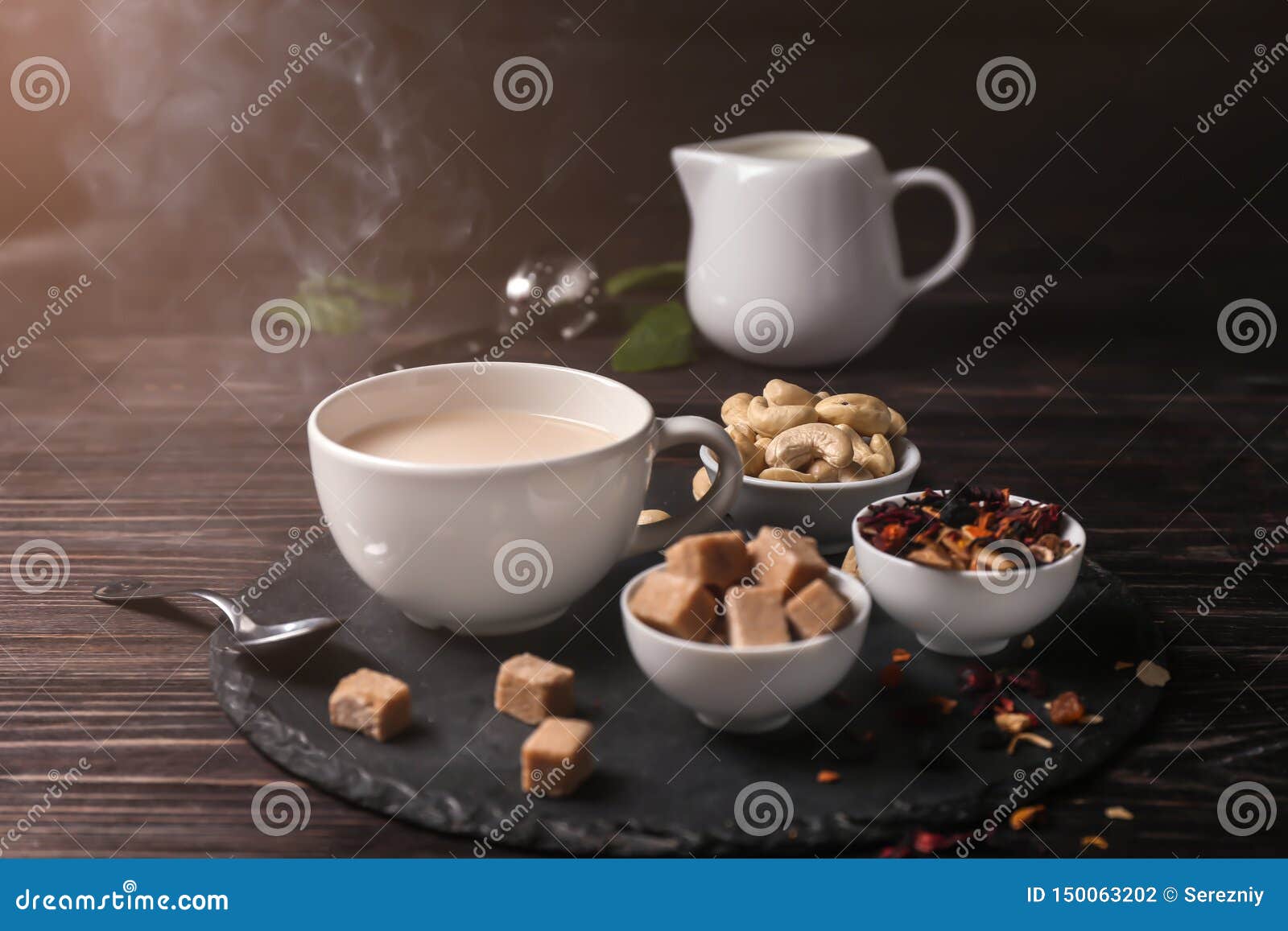 Cup of Aromatic Tea with Milk on Slate Plate Stock Photo - Image of ...