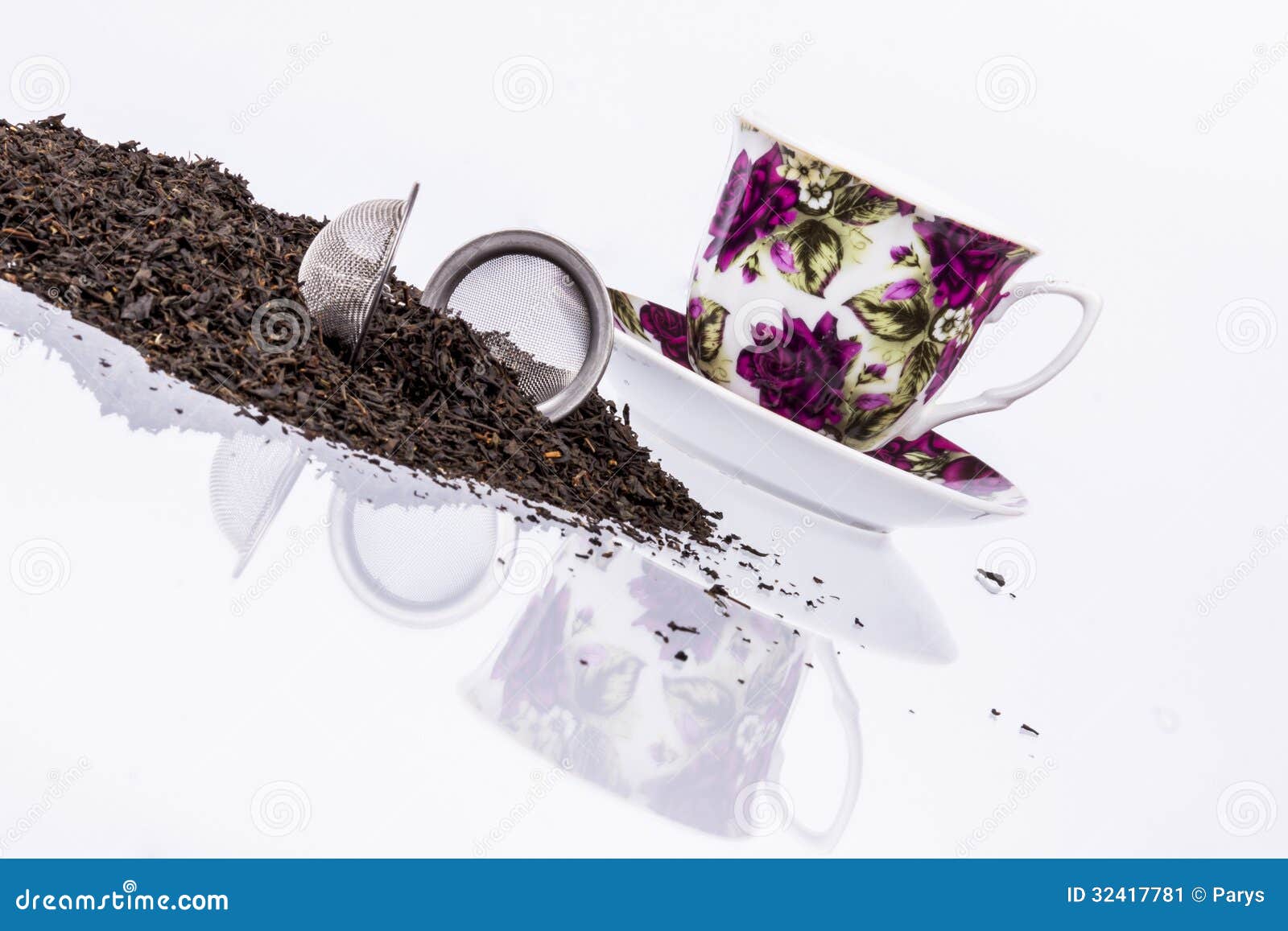 Cup and Black Tea on White Background. Stock Image - Image of leaves