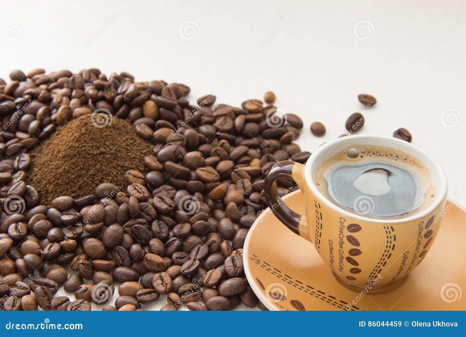 a cup of coffee, coffee beans, ground coffee