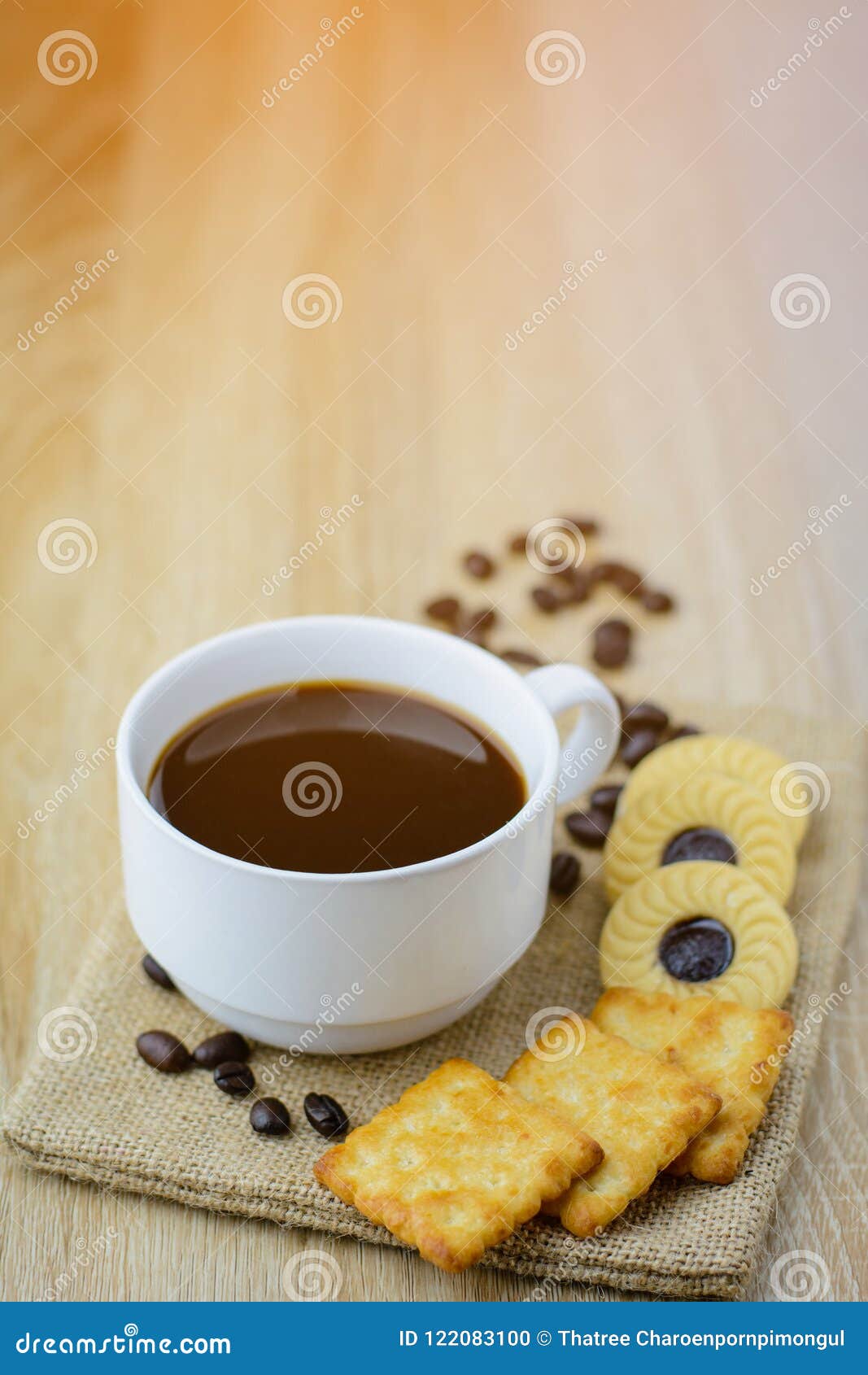 Cup of Coffee with Cracker and Cookie on Wood Table. Stock Photo ...