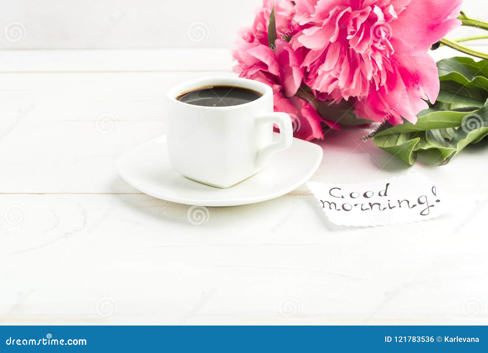 A Cup of Coffee with Peony Flowers and Note `Good Morning` on Wh ...