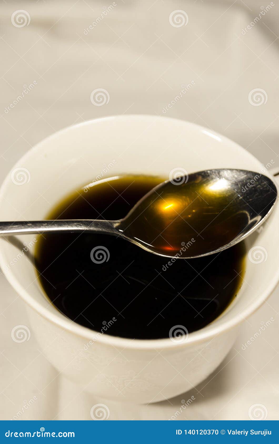Cup of Coffee with a Spoon on it Stock Photo Image of fresh, latte