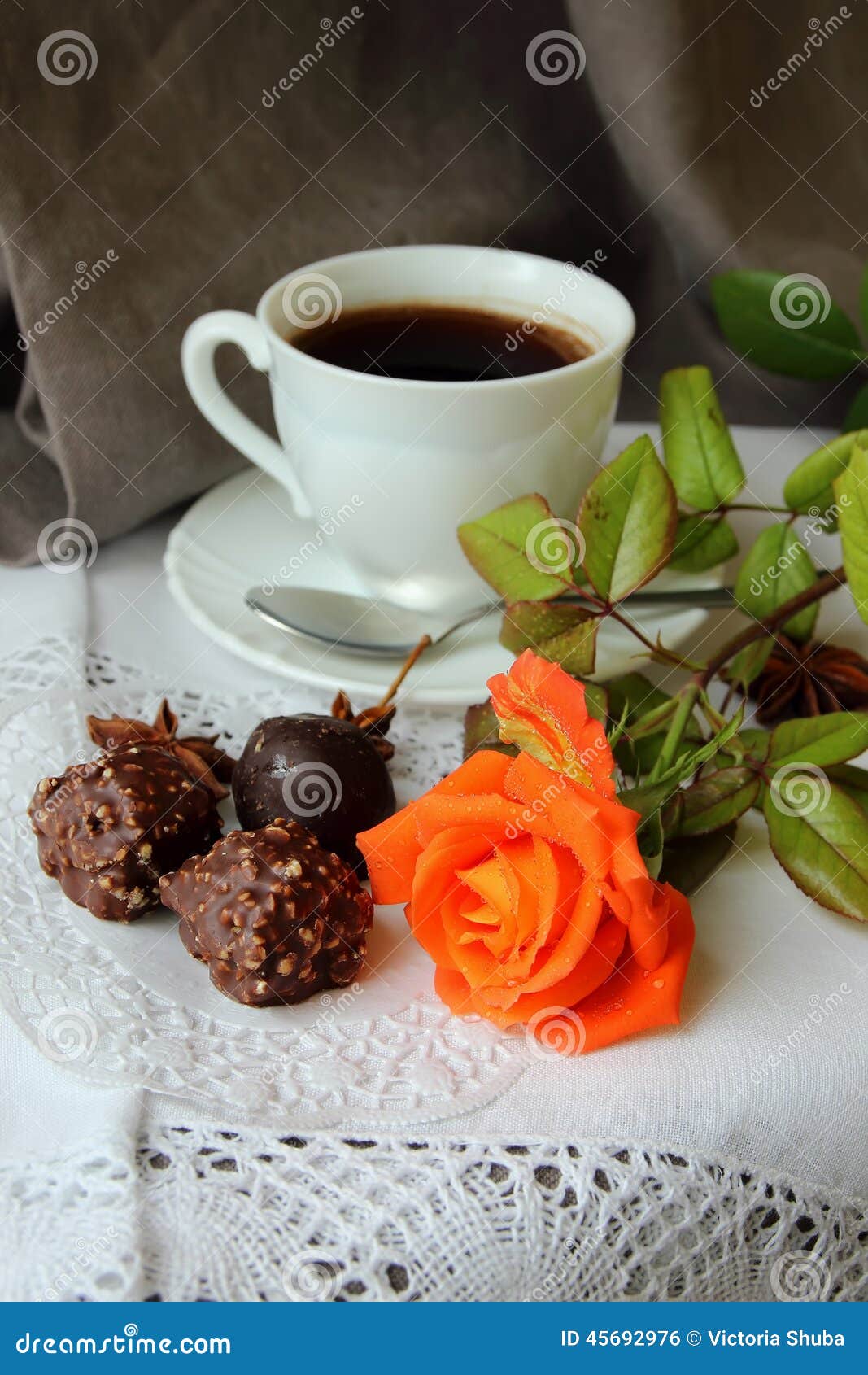 A cup of coffee and sweets stock photo. Image of rosebud 45692976