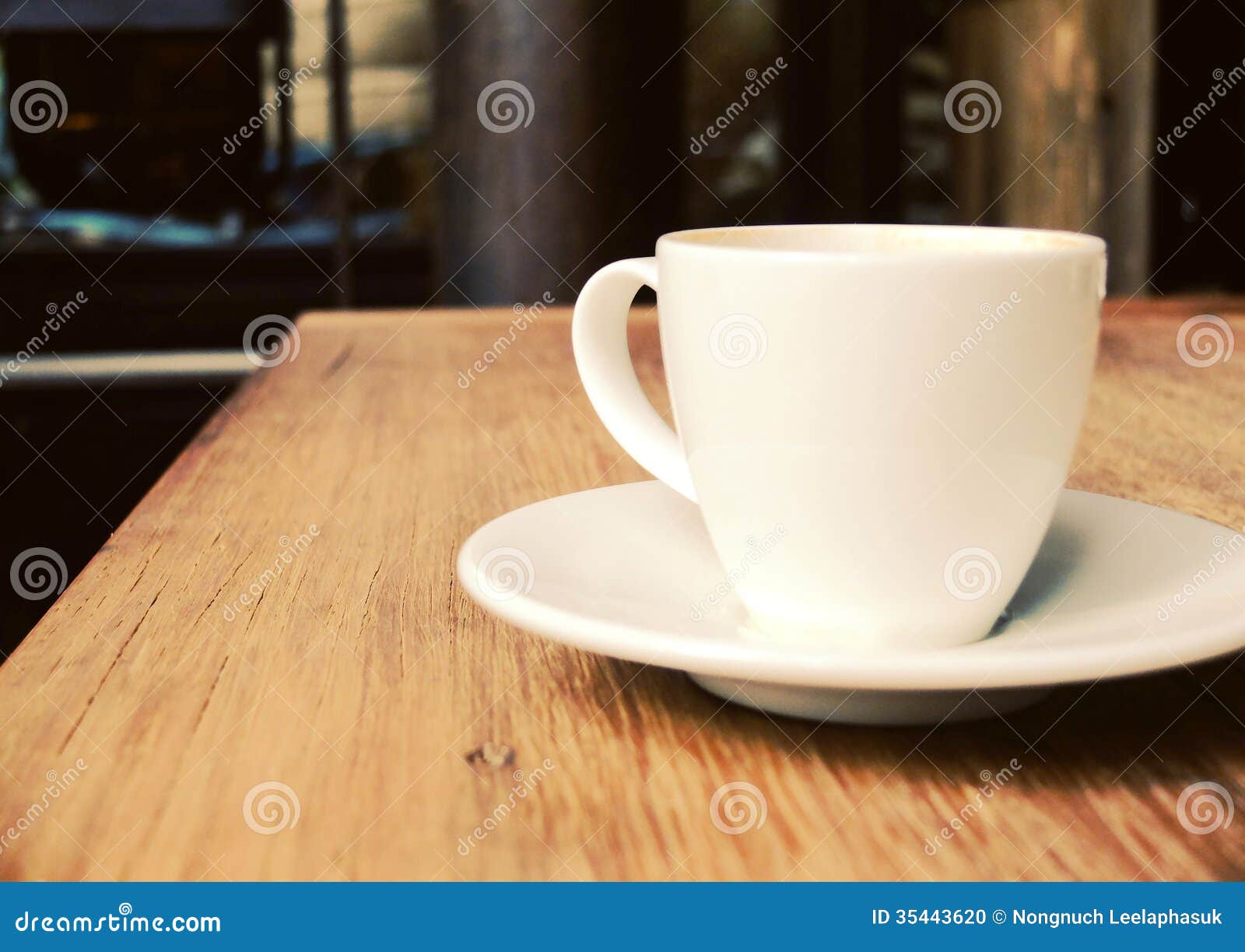 cup of coffee on table at coffee shop stock photo - image: 35443620 cup of coffee on table at coffee shop stock photo - image: 35443620